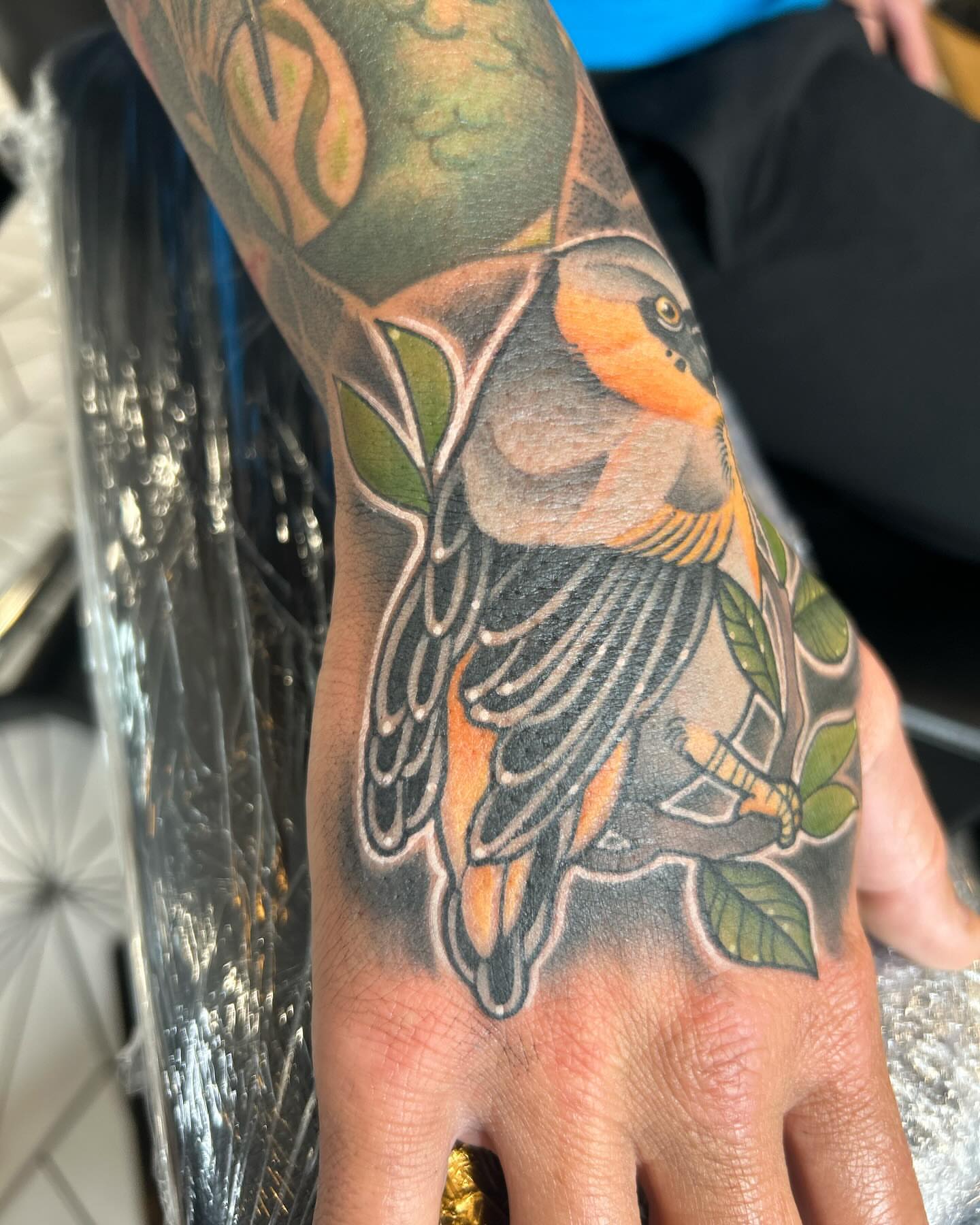 Bird American traditional tattoo on the hand by Taylor Steckman