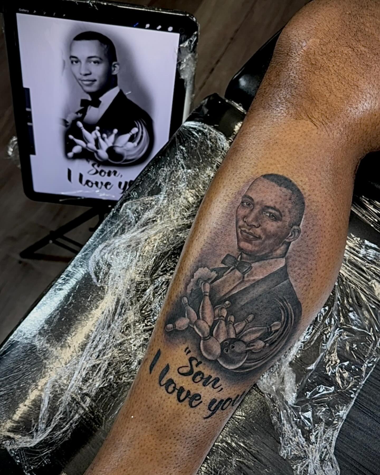Portrait of a man dotwork tattoo on the forearm by Tatt2T (T King)