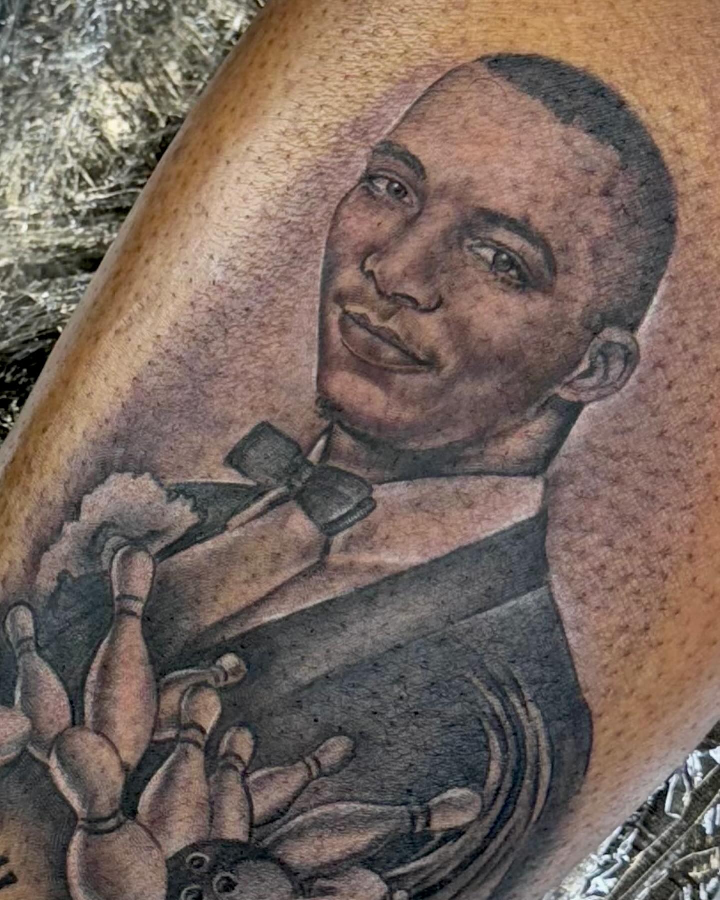 Bowling alley scene realism tattoo on the forearm by Tatt2T (T King)