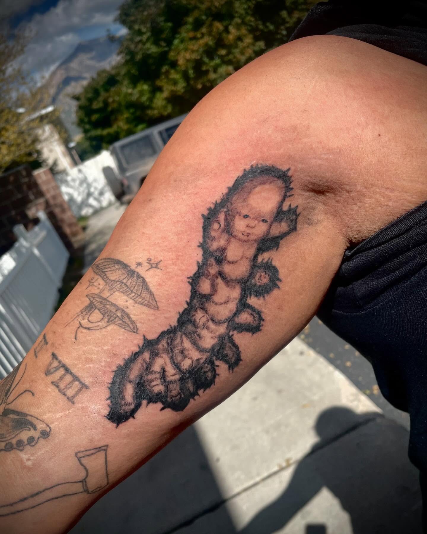 Baby caterpillar American traditional tattoo on the forearm by Kaylee 🗡️