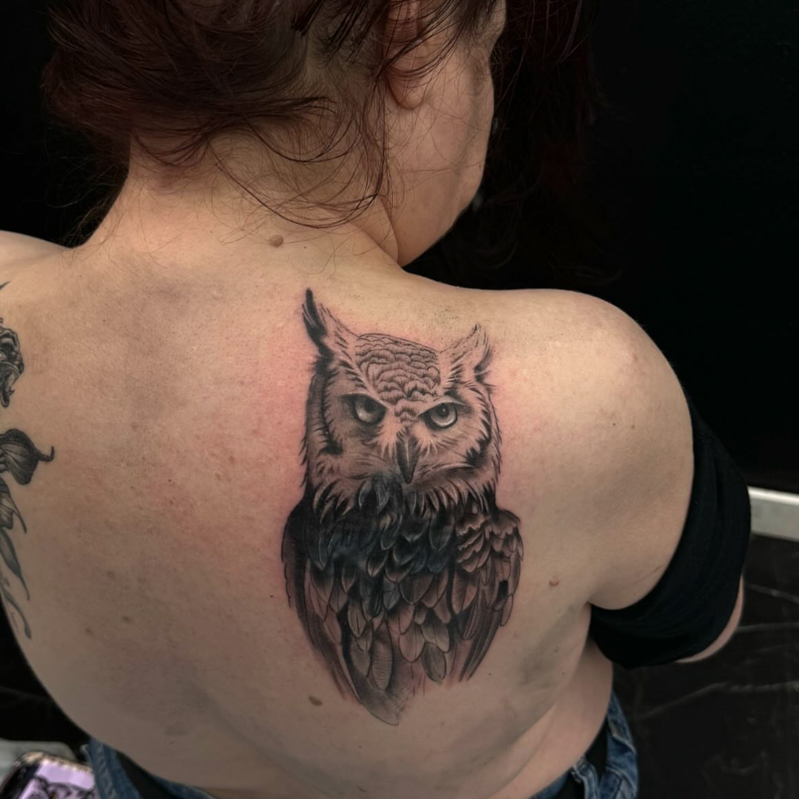 Owl realism tattoo on the shoulder by Amber Lynn