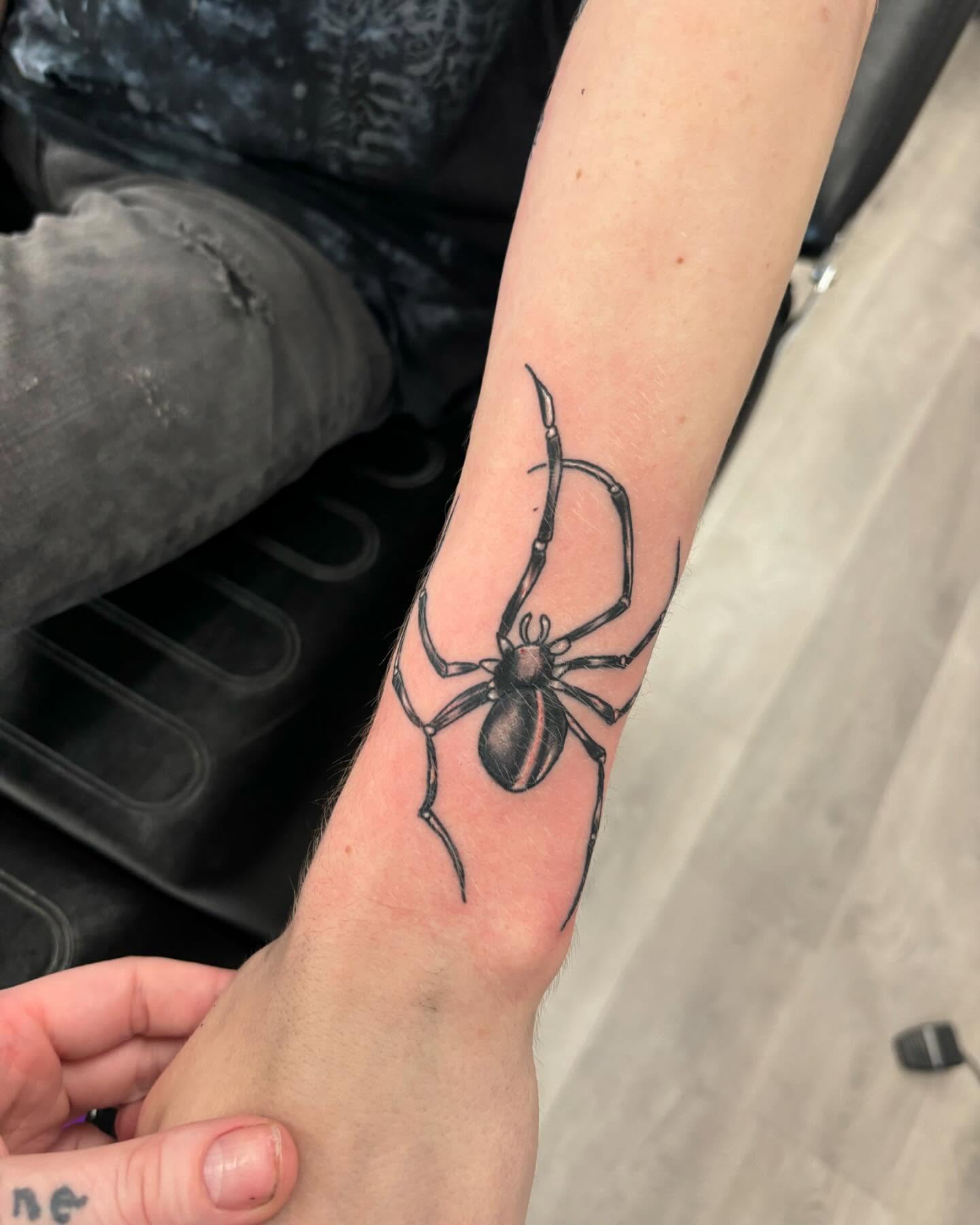 Spider realism tattoo on the forearm by Alyssa Turner