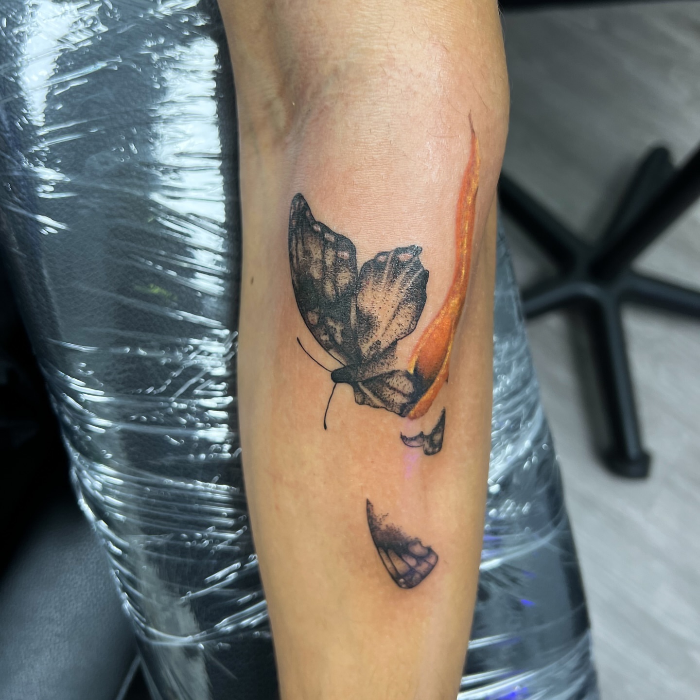 Butterfly dotwork tattoo on the forearm by Syd Cheyenne