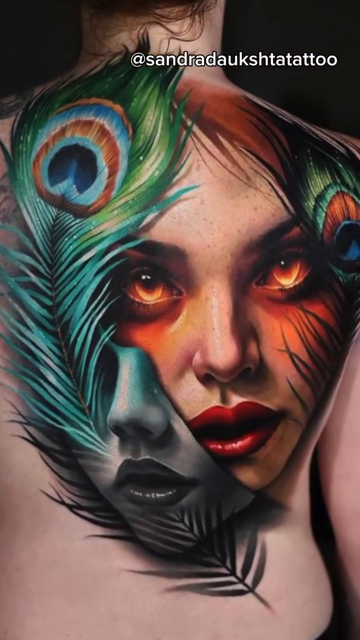 Woman with peacock feathers realism tattoo by Maryssa Anne