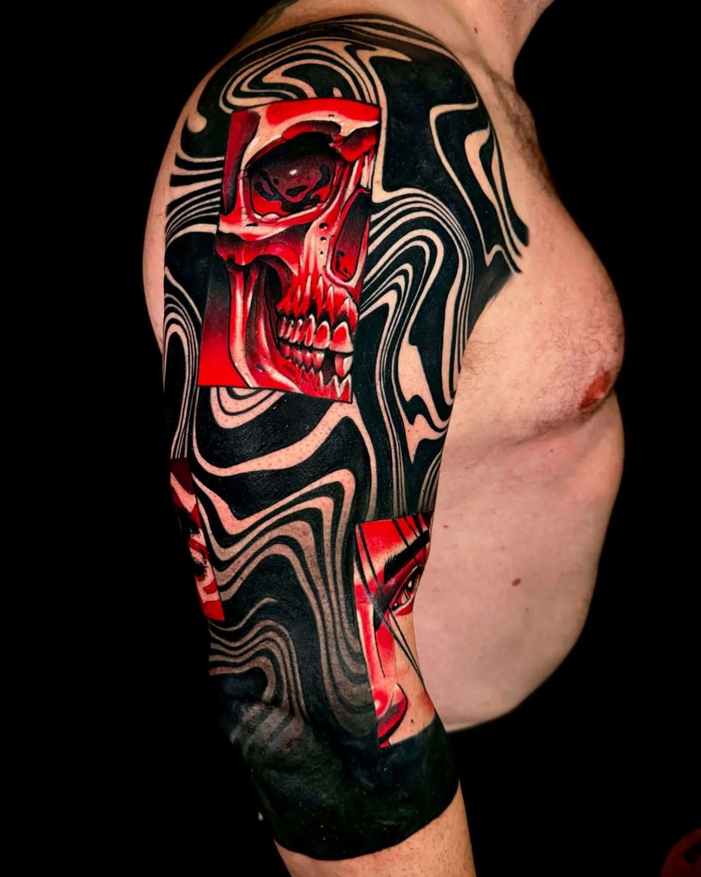 Skull dark realism tattoo on the upper arm by Sweets, Nashville, Tennessee