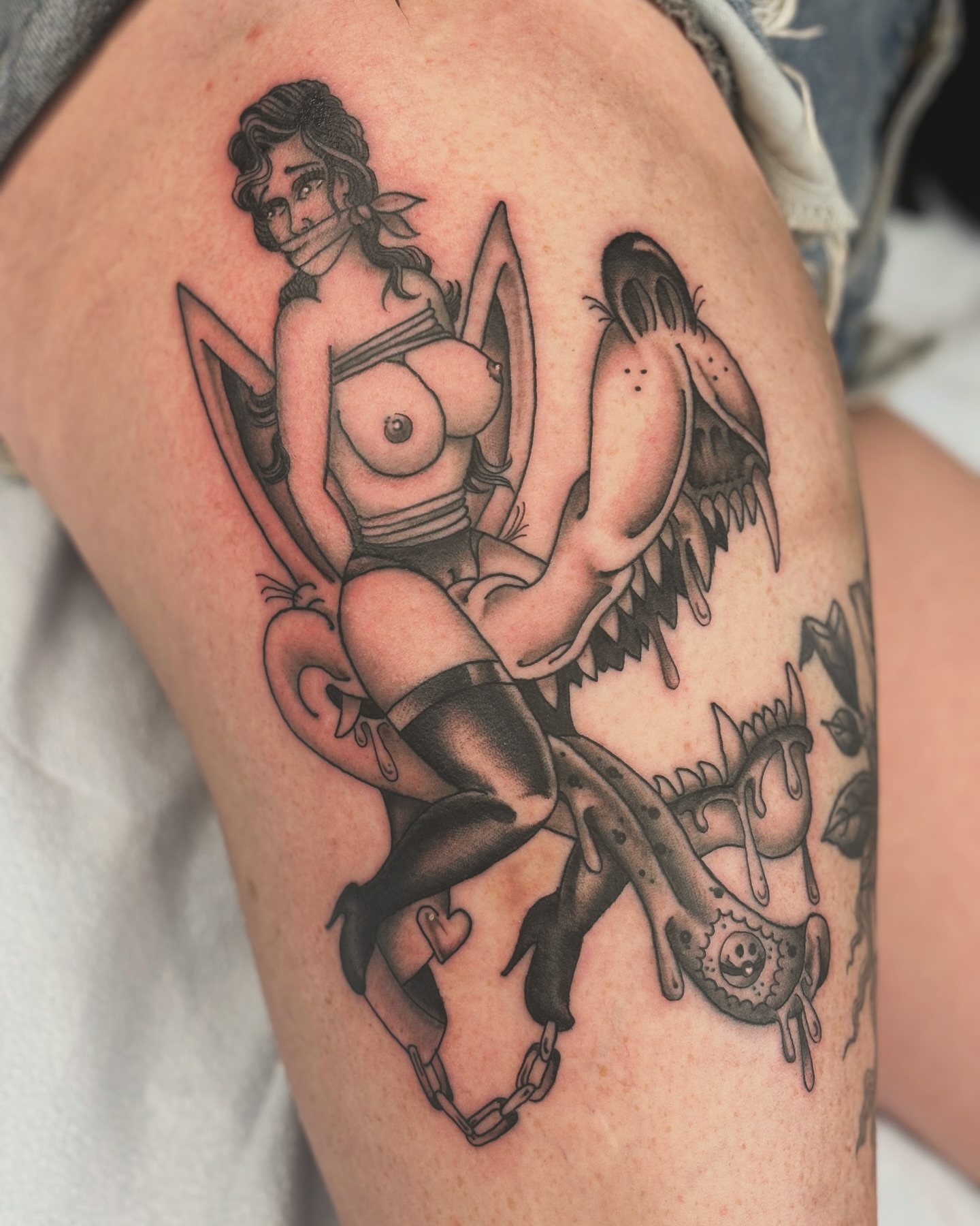 Woman riding creature realism tattoo on the thigh by Adam Bailey, Portland, Oregon