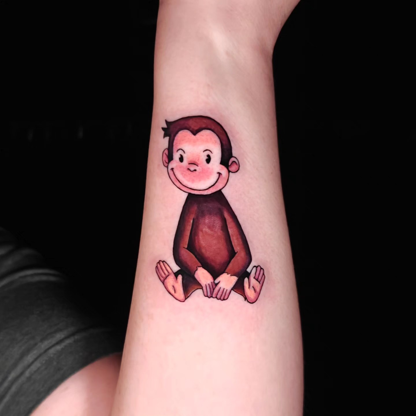 Curious george monkey illustrative tattoo on the forearm by Dallas Tattoo Artist Erik Espinoza
