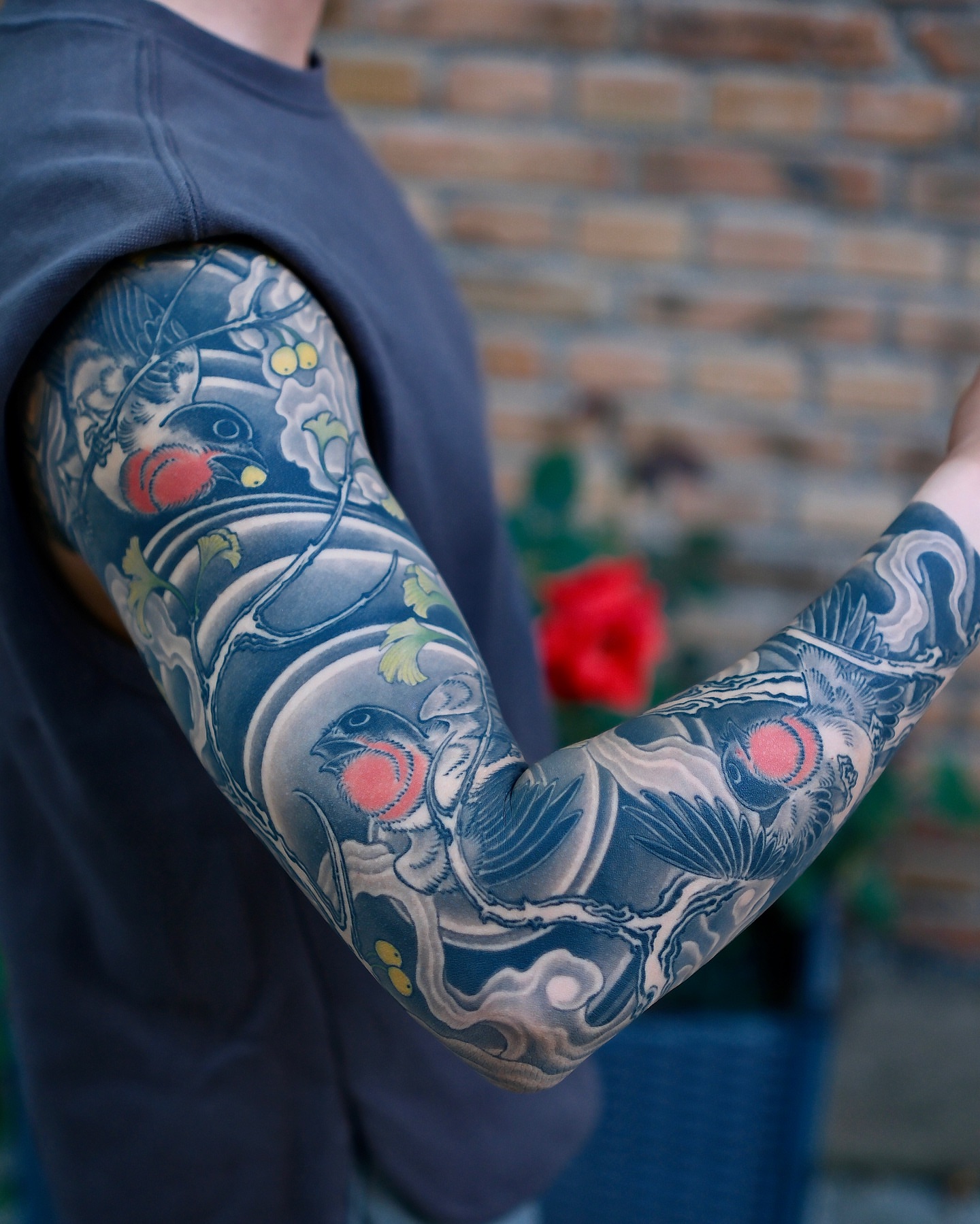 Bird and cherry blossoms japanese irezumi tattoo on the upper arm by Scienz 九卦刺青