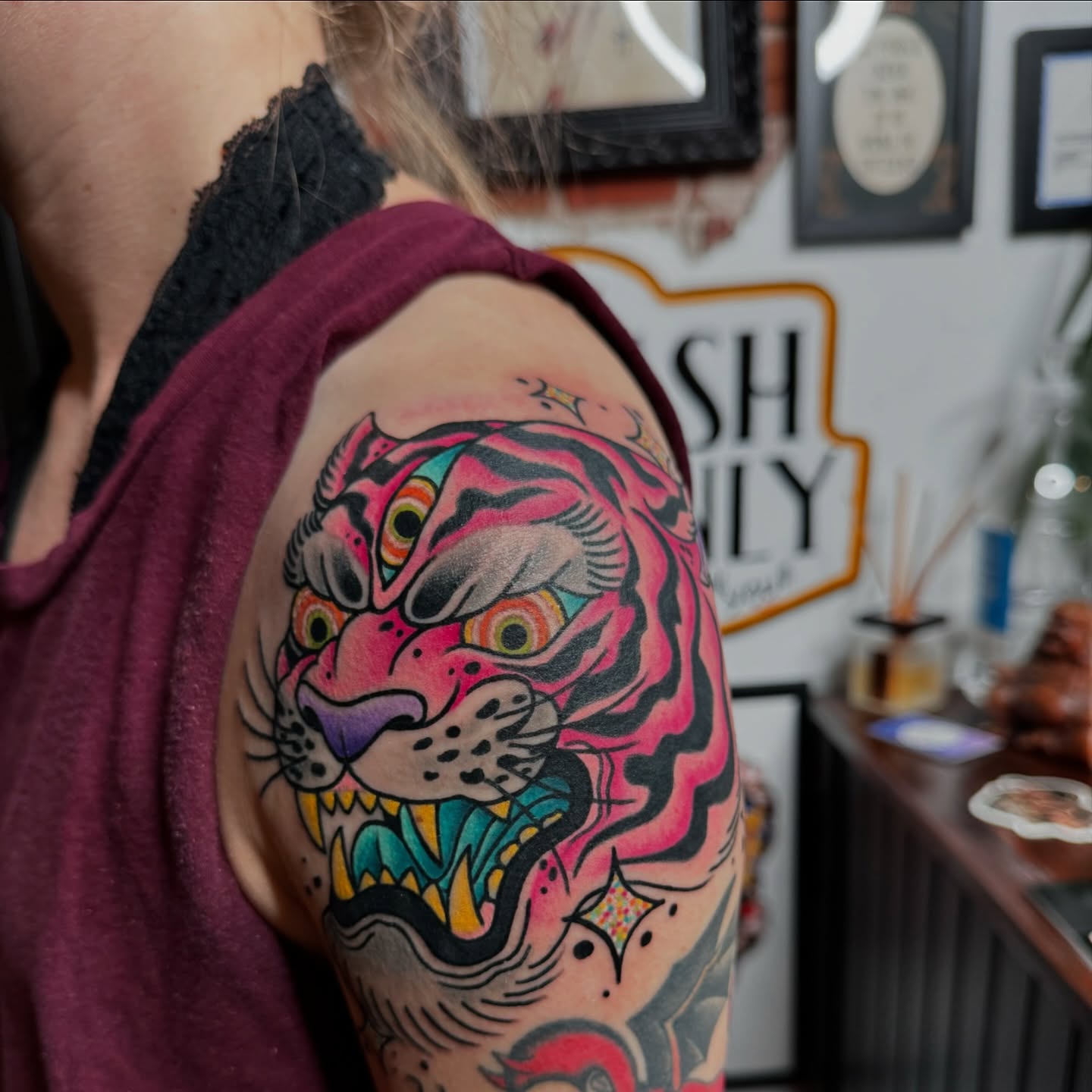 Tiger American traditional tattoo on the shoulder by kenneth nash
