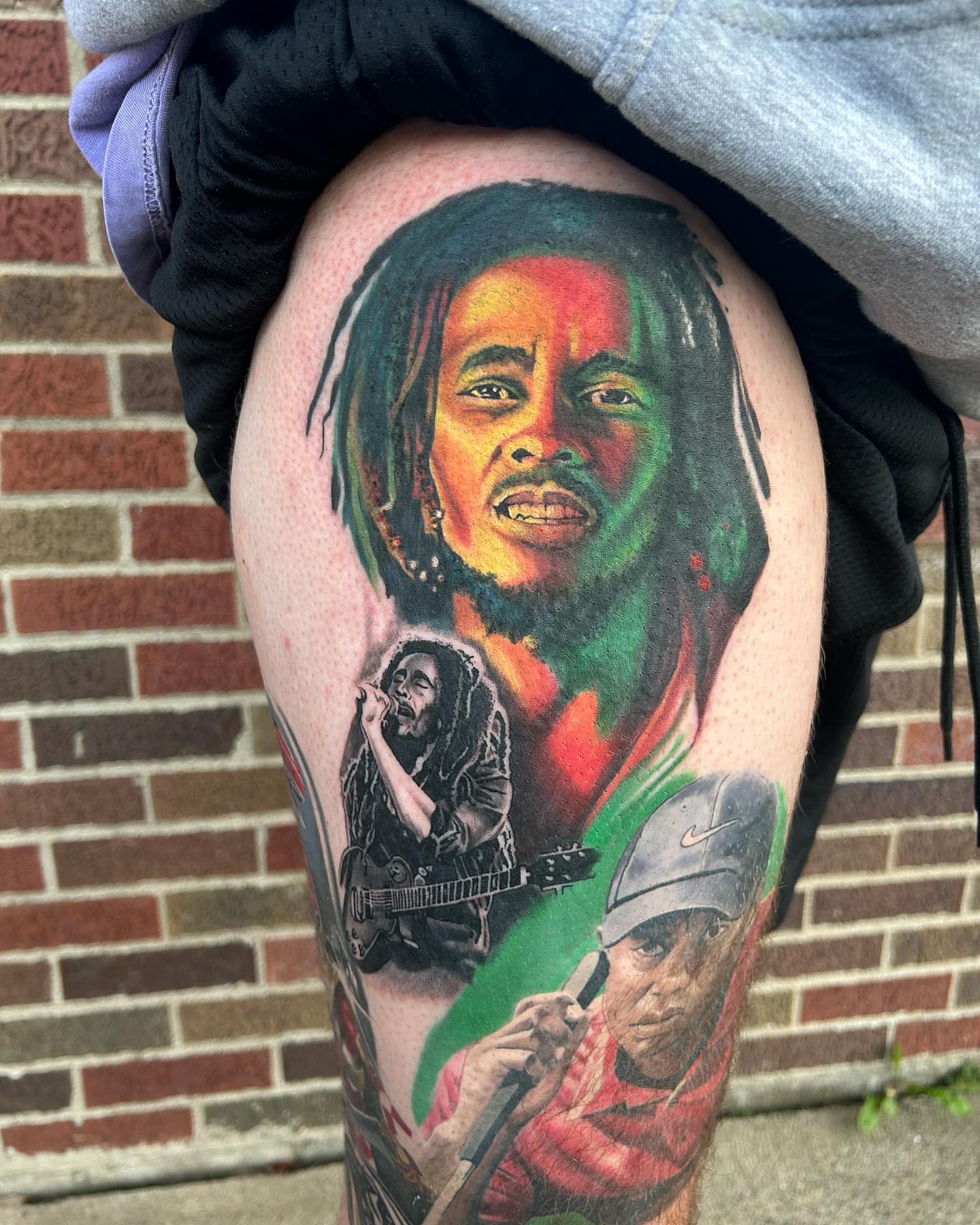 Bob Marley tribute realism tattoo on the thigh by Adam Zgorliski_STStattoo