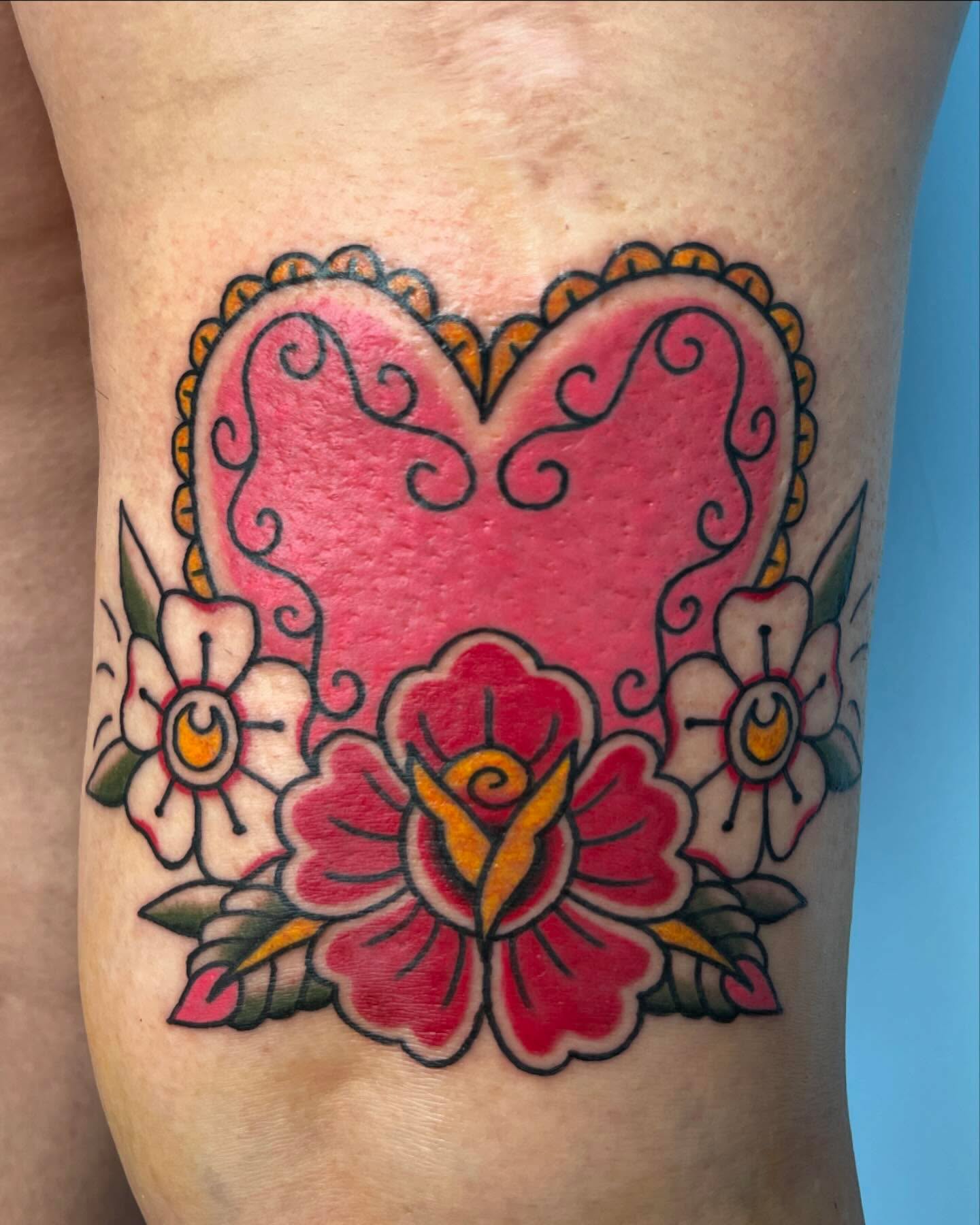 Heart with floral motifs American traditional tattoo on the forearm by ✮KAT✮