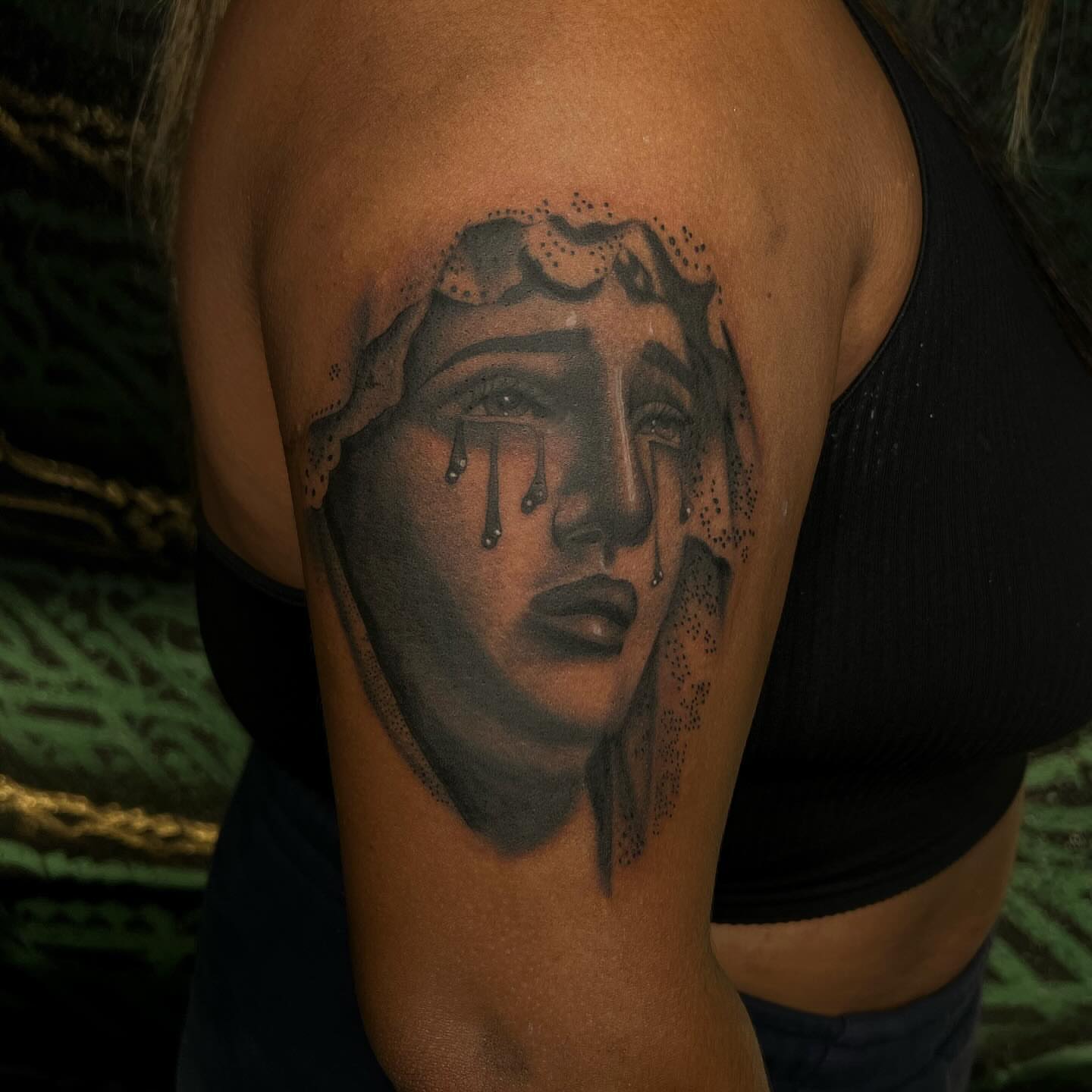 Weeping woman dotwork tattoo on the shoulder by Kayla Cordova