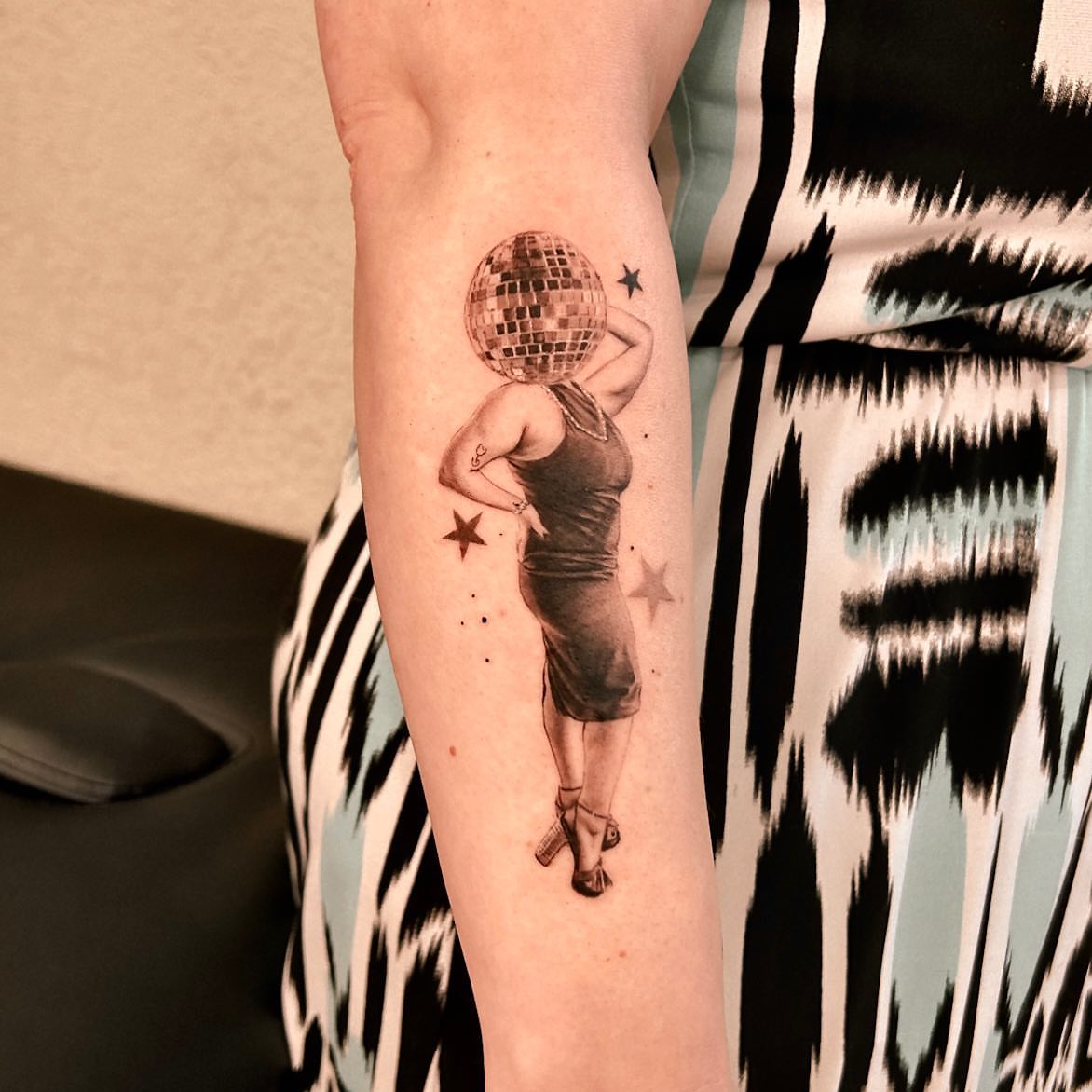 Disco ball woman realism tattoo on the forearm by Longtea