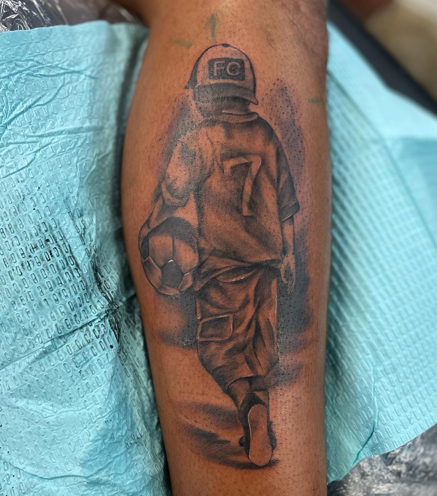 Soccer player realism tattoo on the forearm by Chuy E ⚡️