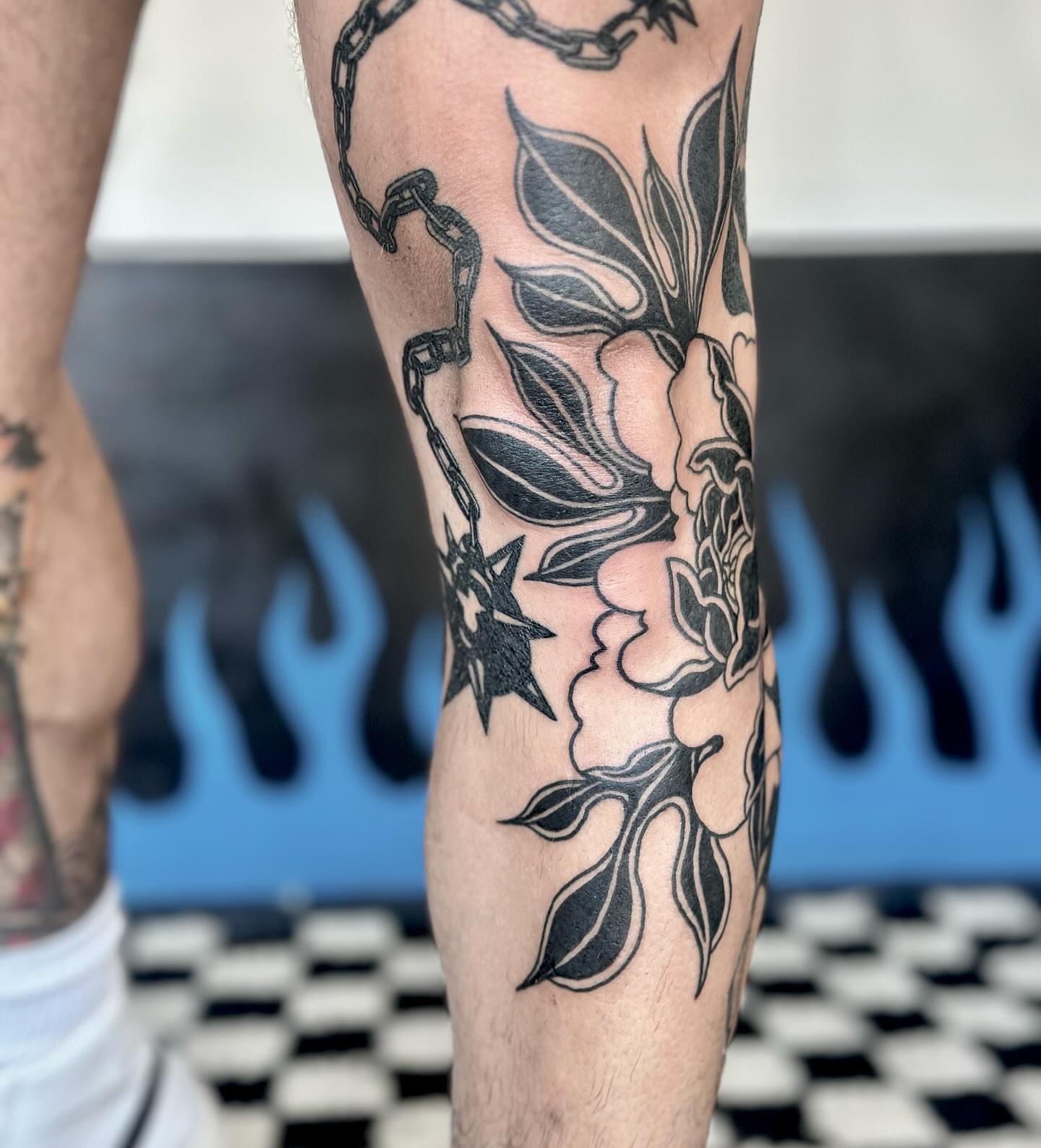 Flower and chain black and grey tattoo on the forearm by Han shinko, Portland, Oregon