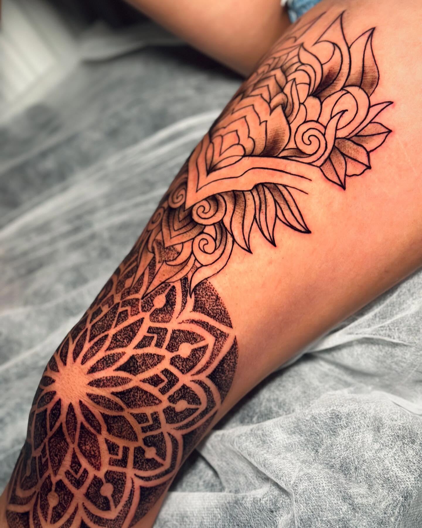 Floral mandala dotwork tattoo on the thigh by Anghel Patricia