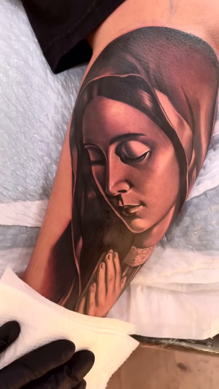 Virgin Mary with praying hands realism tattoo by Erick Gutierrez, Las Vegas, Nevada