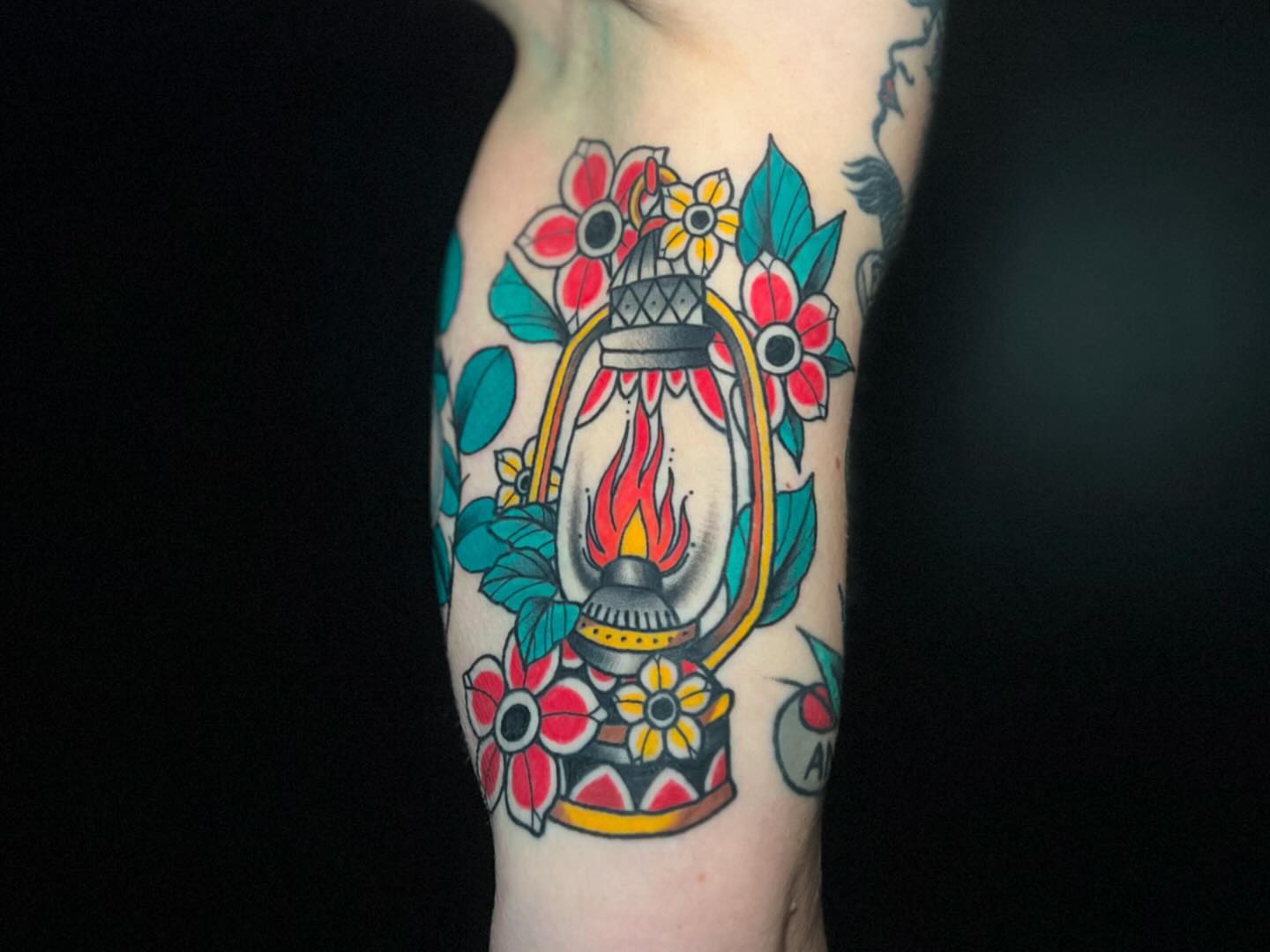 Lantern with flowers American traditional tattoo on the forearm by Brooke, Kansas City, Missouri