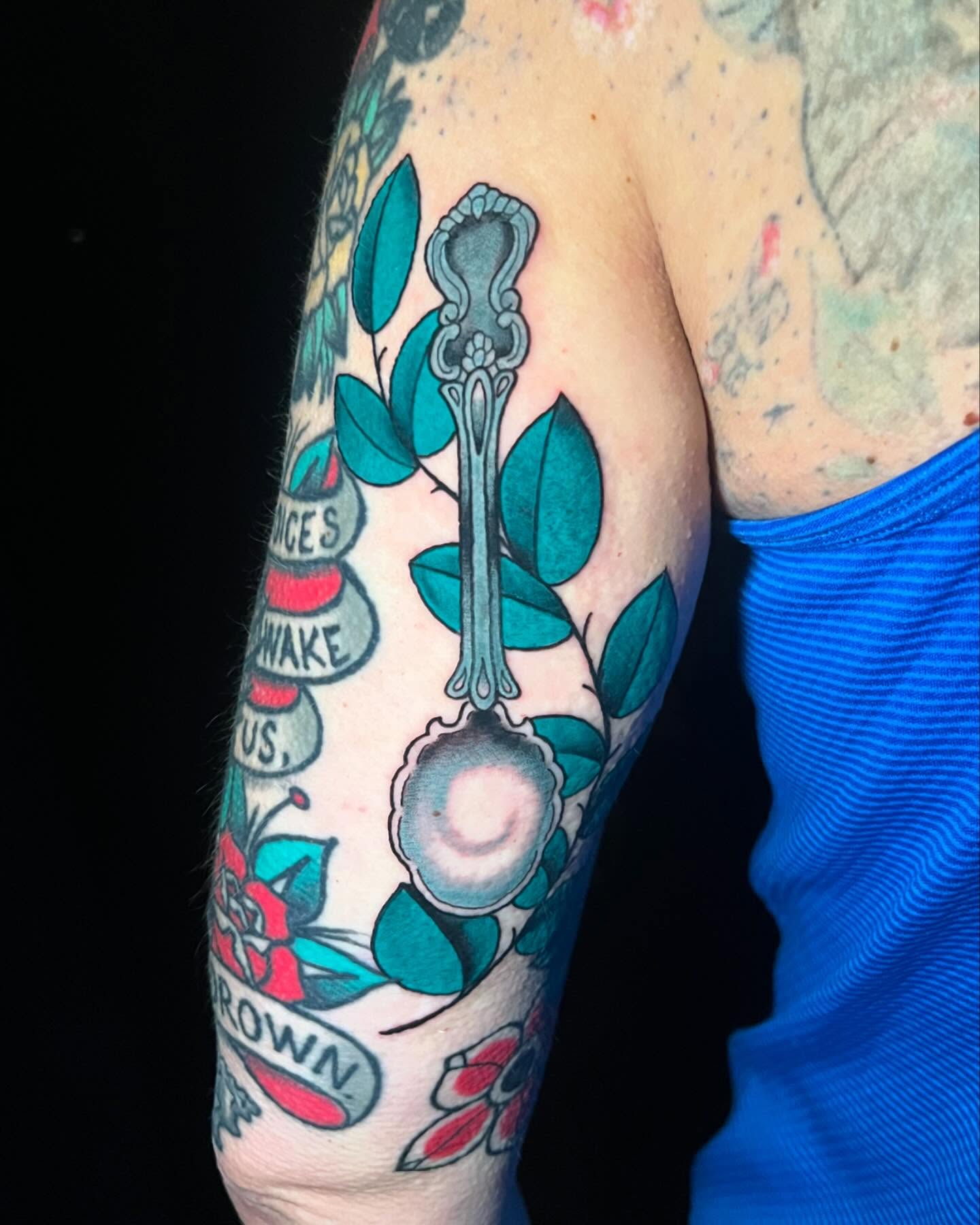 Spoon and leaves American traditional tattoo on the forearm by Brooke, Kansas City, Missouri