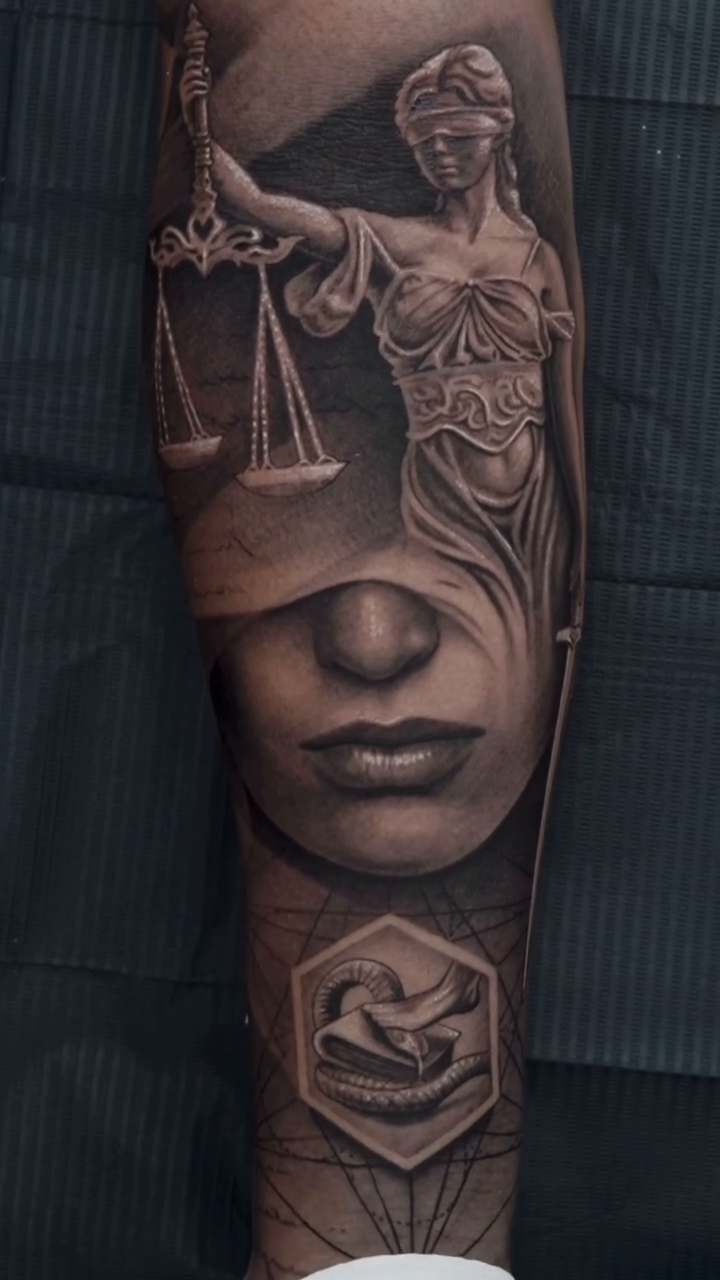 Lady Justice and a face realism tattoo by Jesus Alonso
