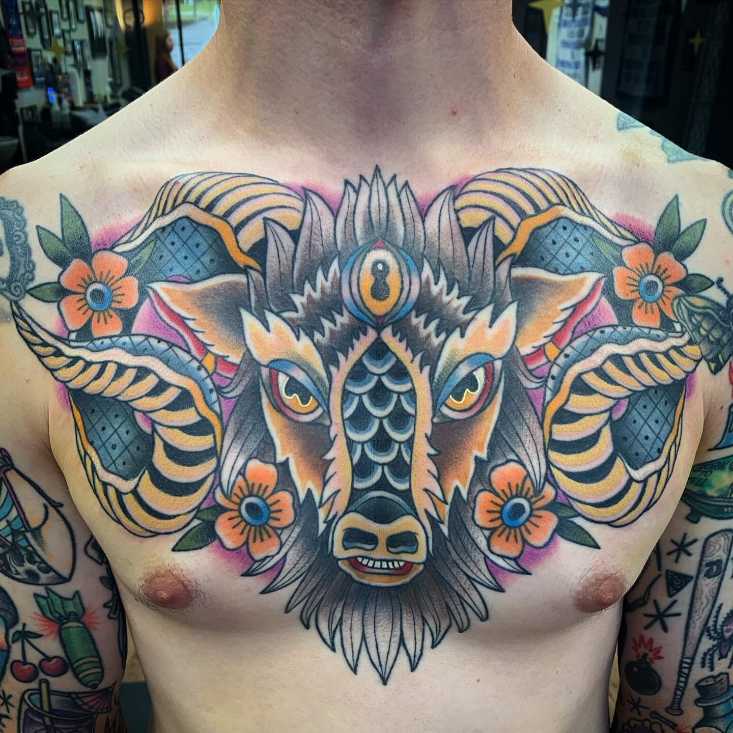 Bull American traditional tattoo on the chest by Brad Sterling