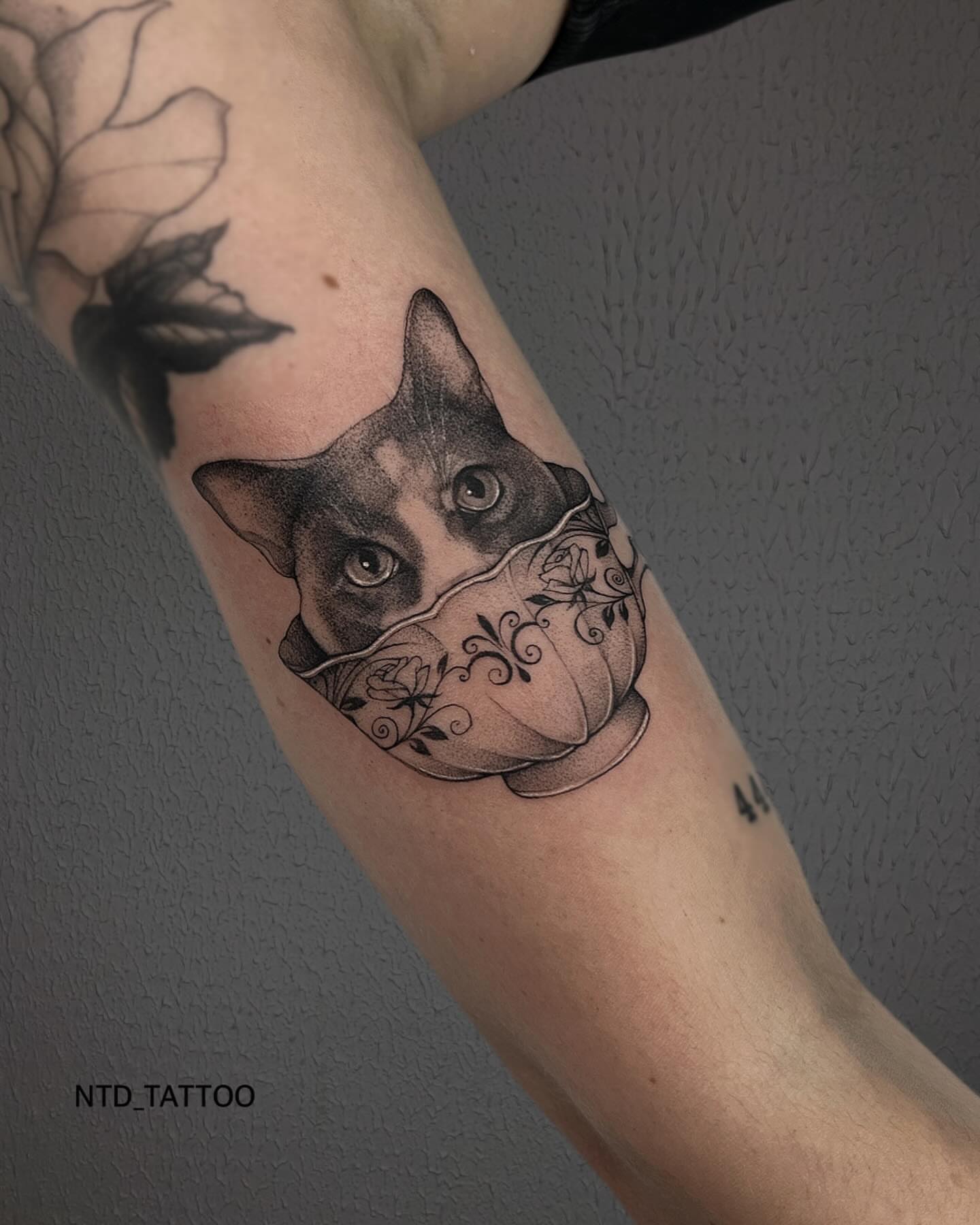 Tattoo by @ntd_tattoo — dotwork, realism