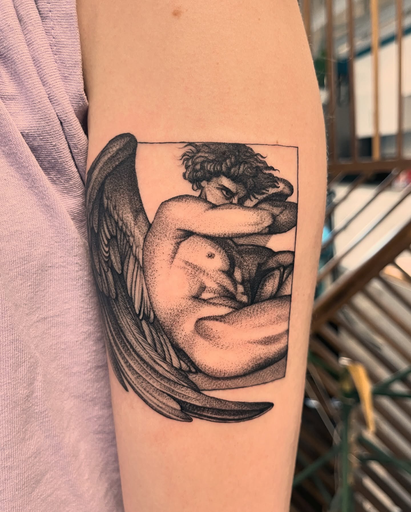 Angel embracing dotwork tattoo on the forearm by Carla AKA Turnip girl