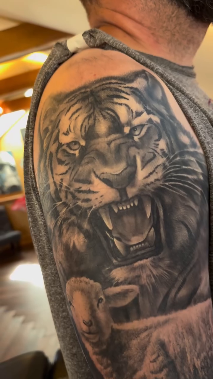 Tattoo by @brycemoodietattoo — realism, black_and_grey