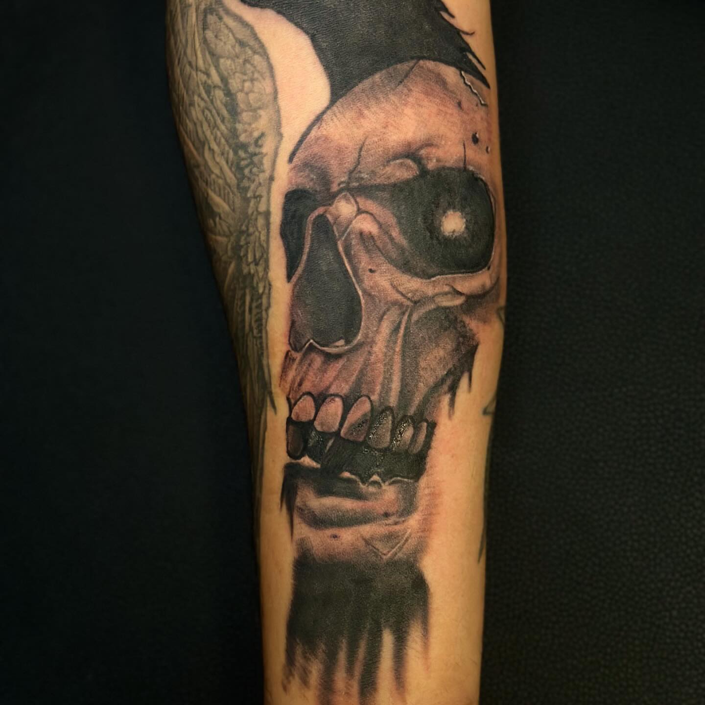 Skull realism tattoo on the forearm by Aj Negrete Jr.