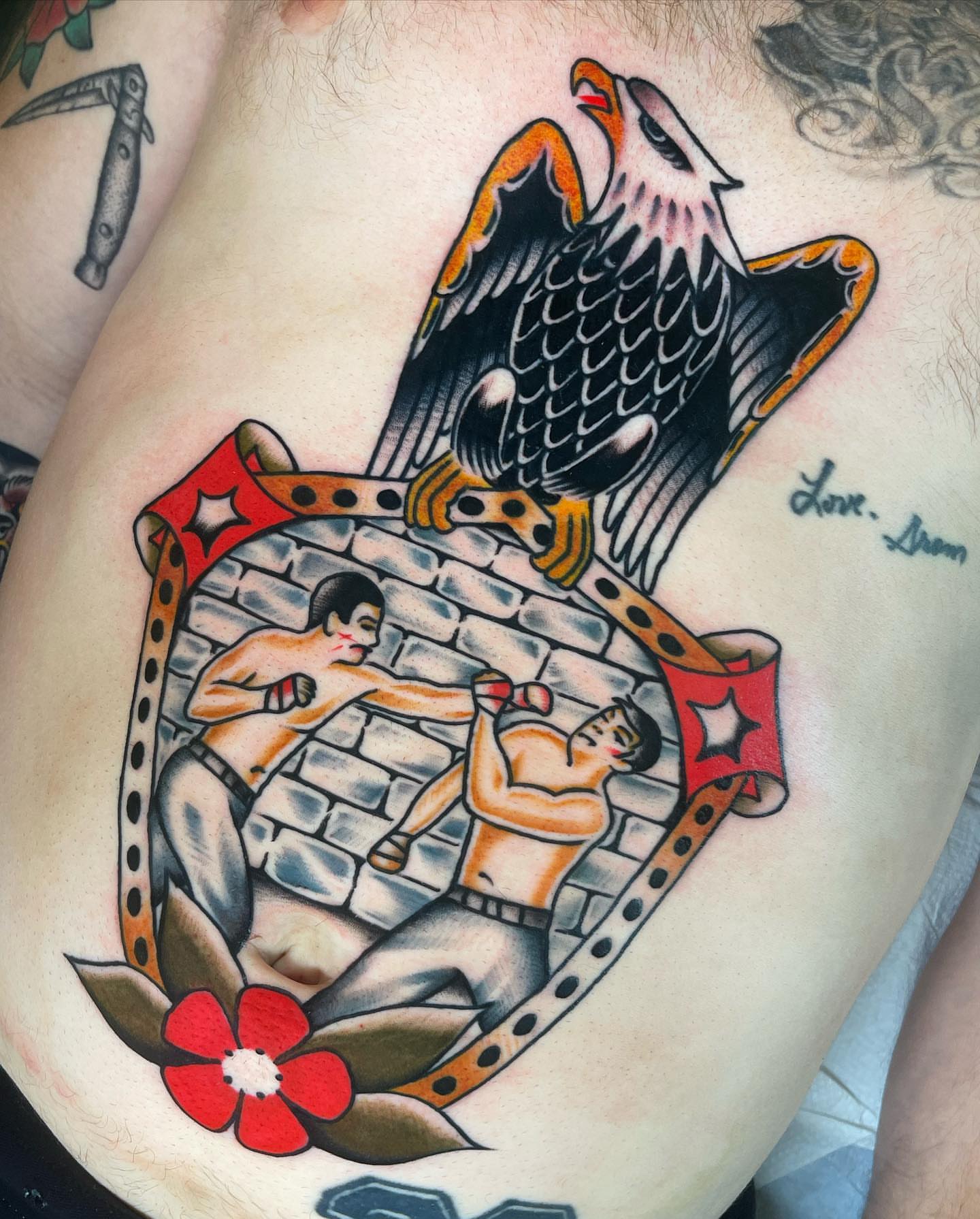Sumo wrestlers American traditional tattoo on the thigh by Jeff Miller philly traditional tattoo