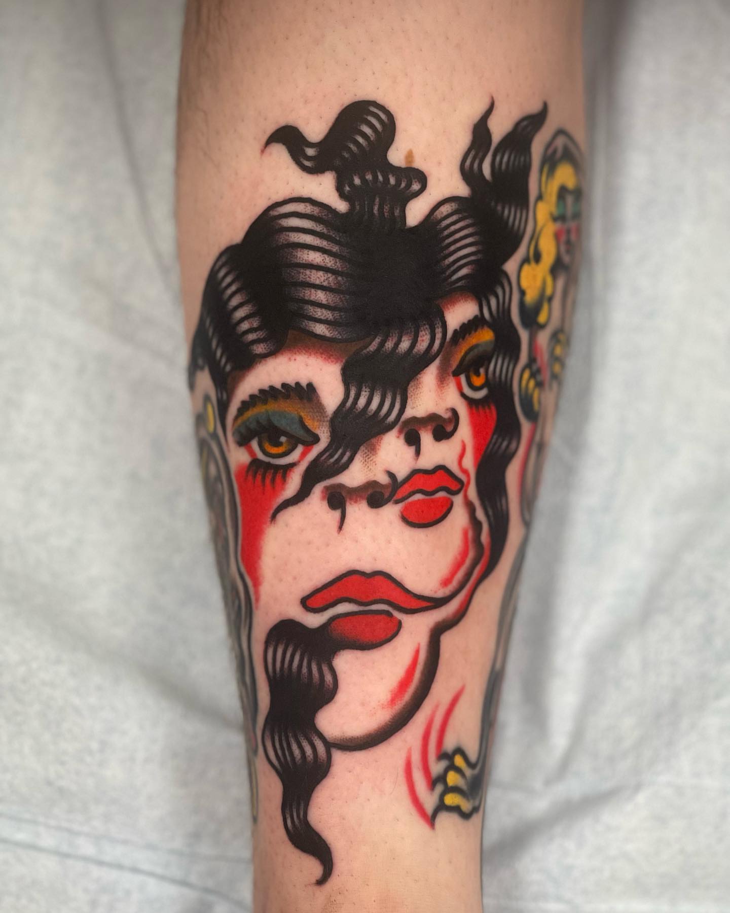 Woman's face American traditional tattoo on the forearm by Jeff Miller philly traditional tattoo