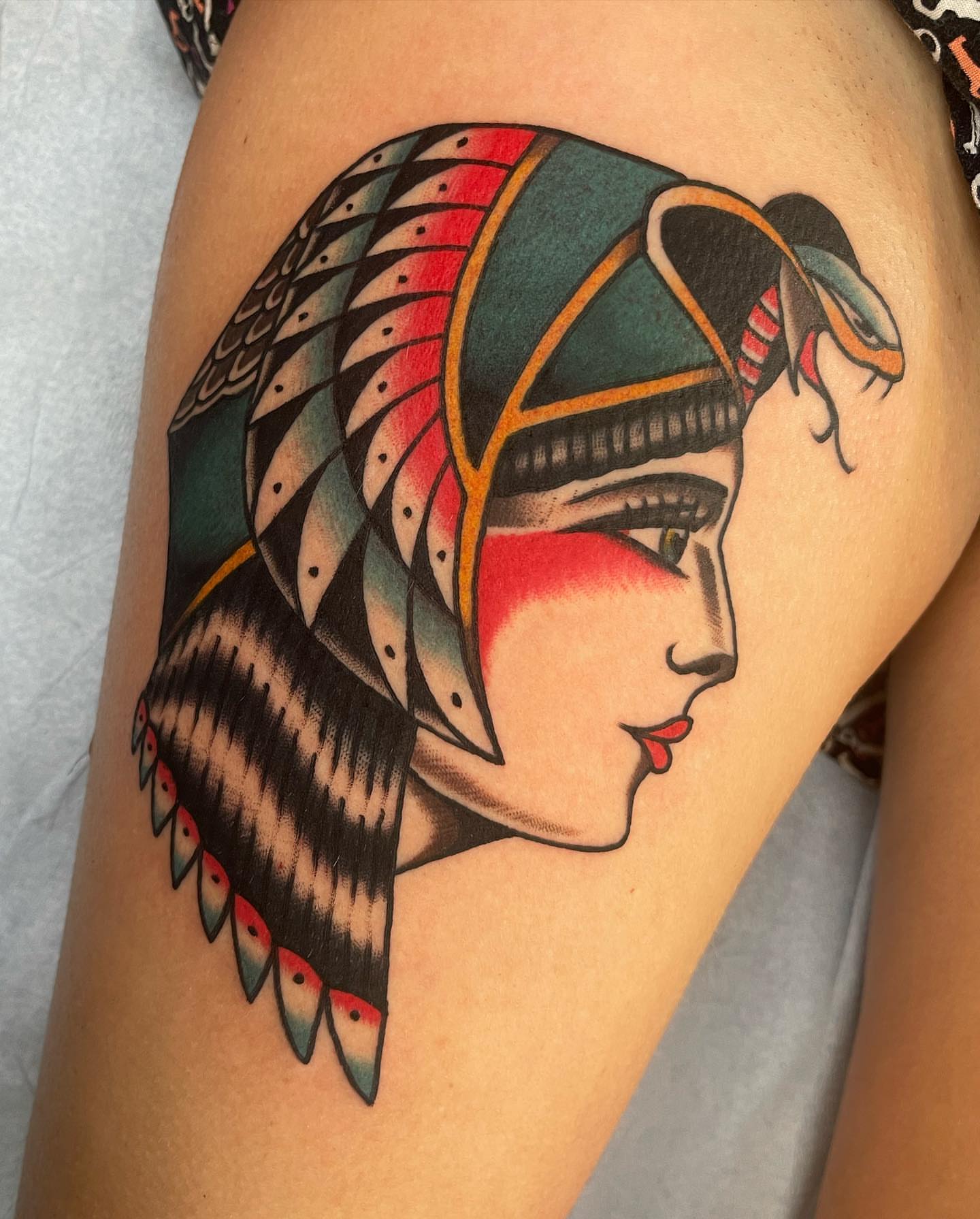 Ancient headdress American traditional tattoo on the shoulder by Jeff Miller philly traditional tattoo