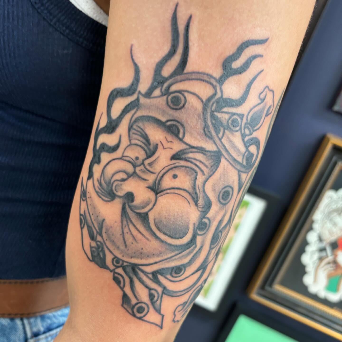 Mechanical creature black and grey tattoo on the forearm by Amy Kolton