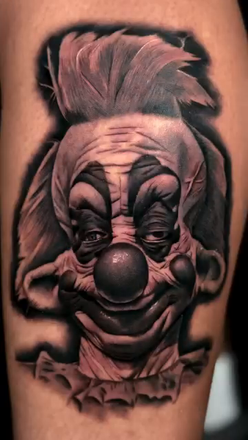Clown portrait realism tattoo by Kaleb Trujillo