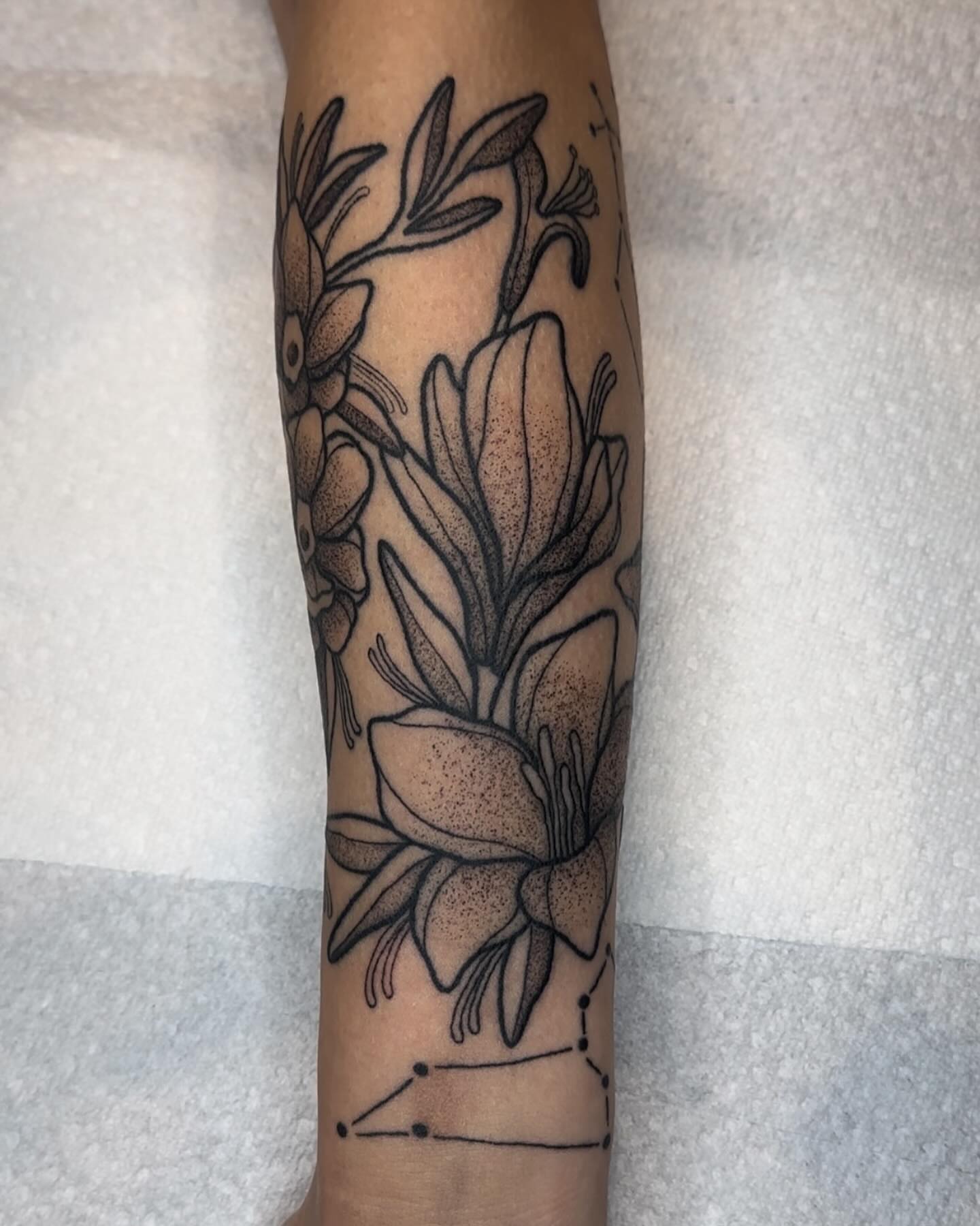Flowers and constellation dotwork tattoo on the forearm by savannah ★ ( previously feralratbabe )