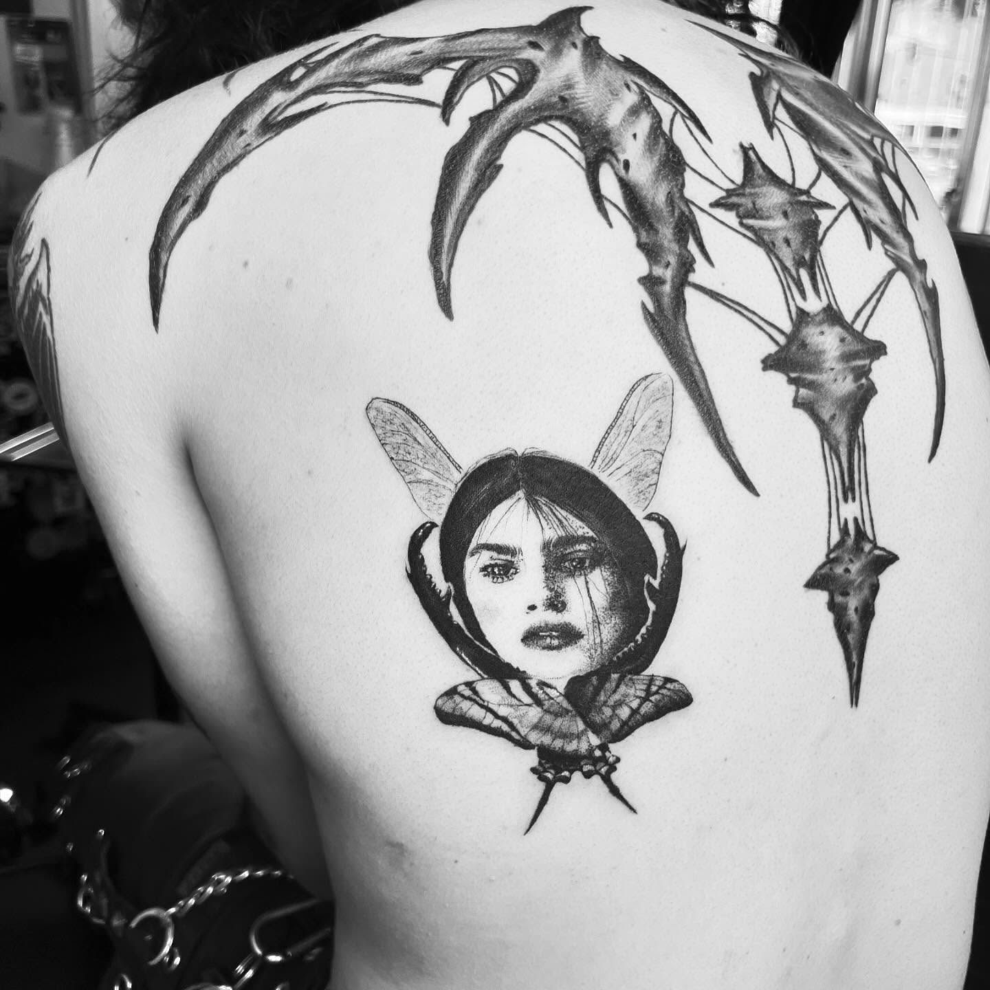 Fairy realism tattoo on the back by Ladyjutsu