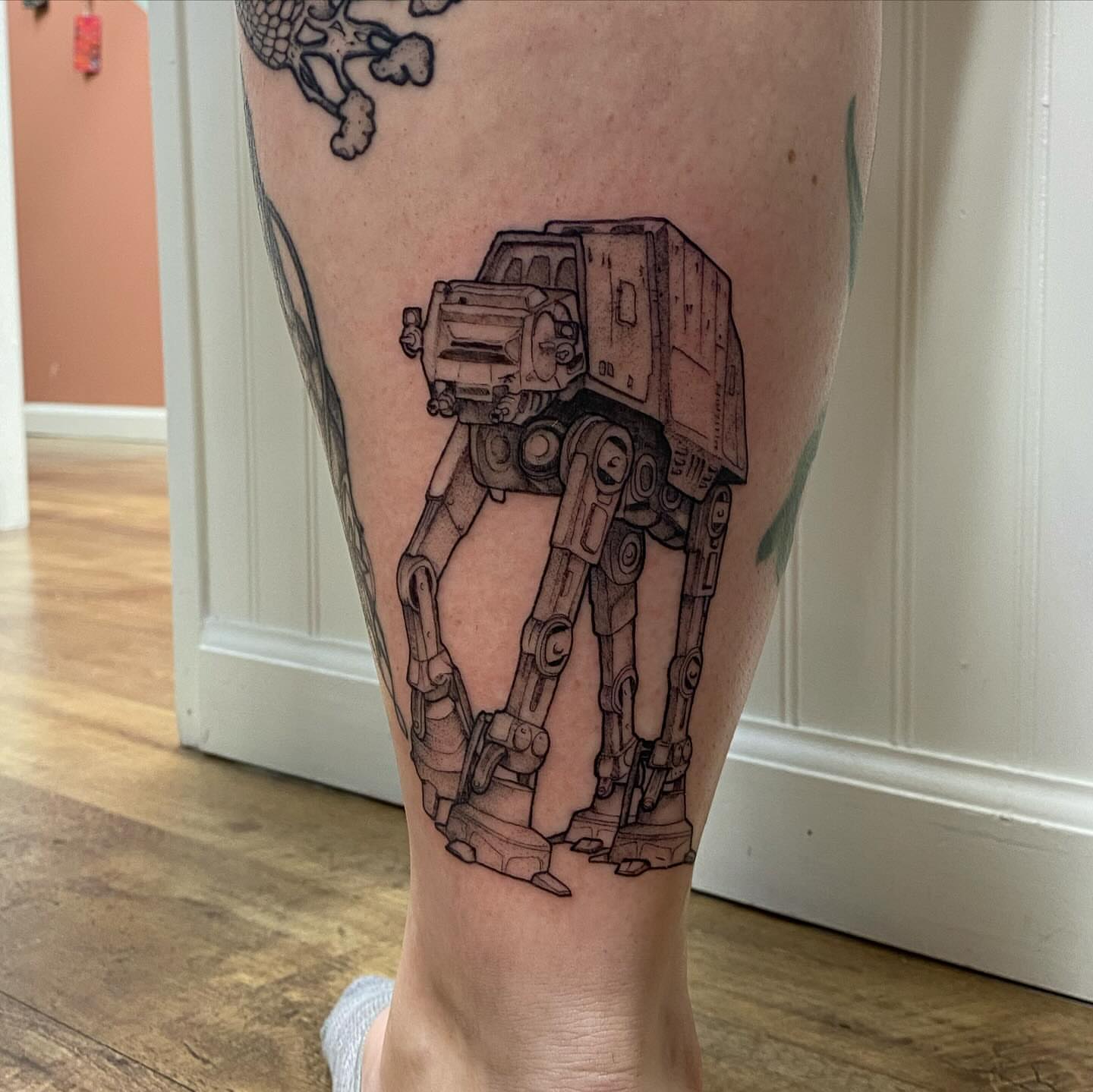 AT-AT walker black and grey tattoo on the calf by Amber Lea, Kansas City, Kansas