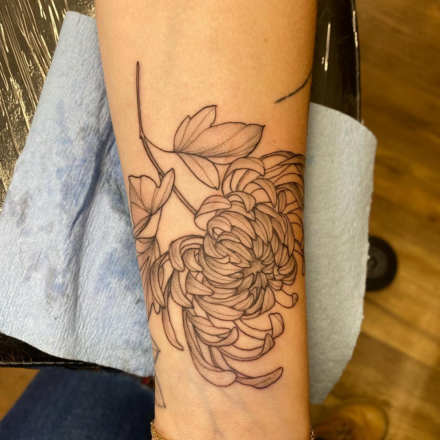 Chrysanthemum black and grey tattoo on the forearm by Amber Lea, Kansas City, Kansas