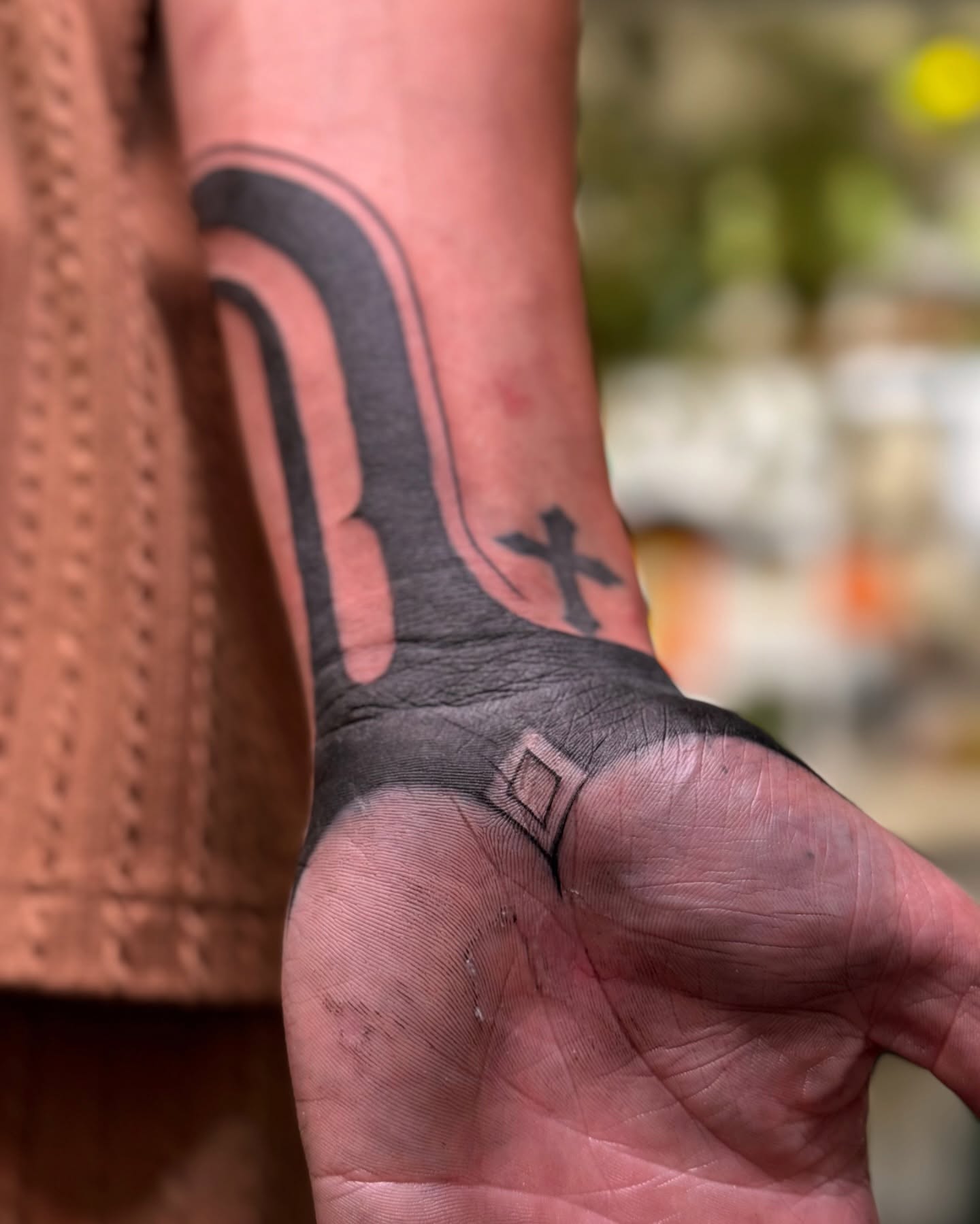 Cross and geometric shapes black and grey tattoo on the forearm by Hailey K - Arizona Tattoo Artist, Miami, Florida