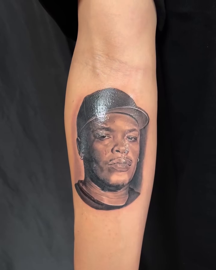 Dr. Dre portrait realism tattoo by Thomas Conard