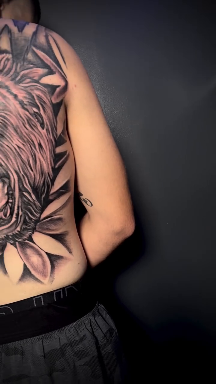 Gorilla head with leaves realism tattoo by Paul burrows (Tatttoo Artist)