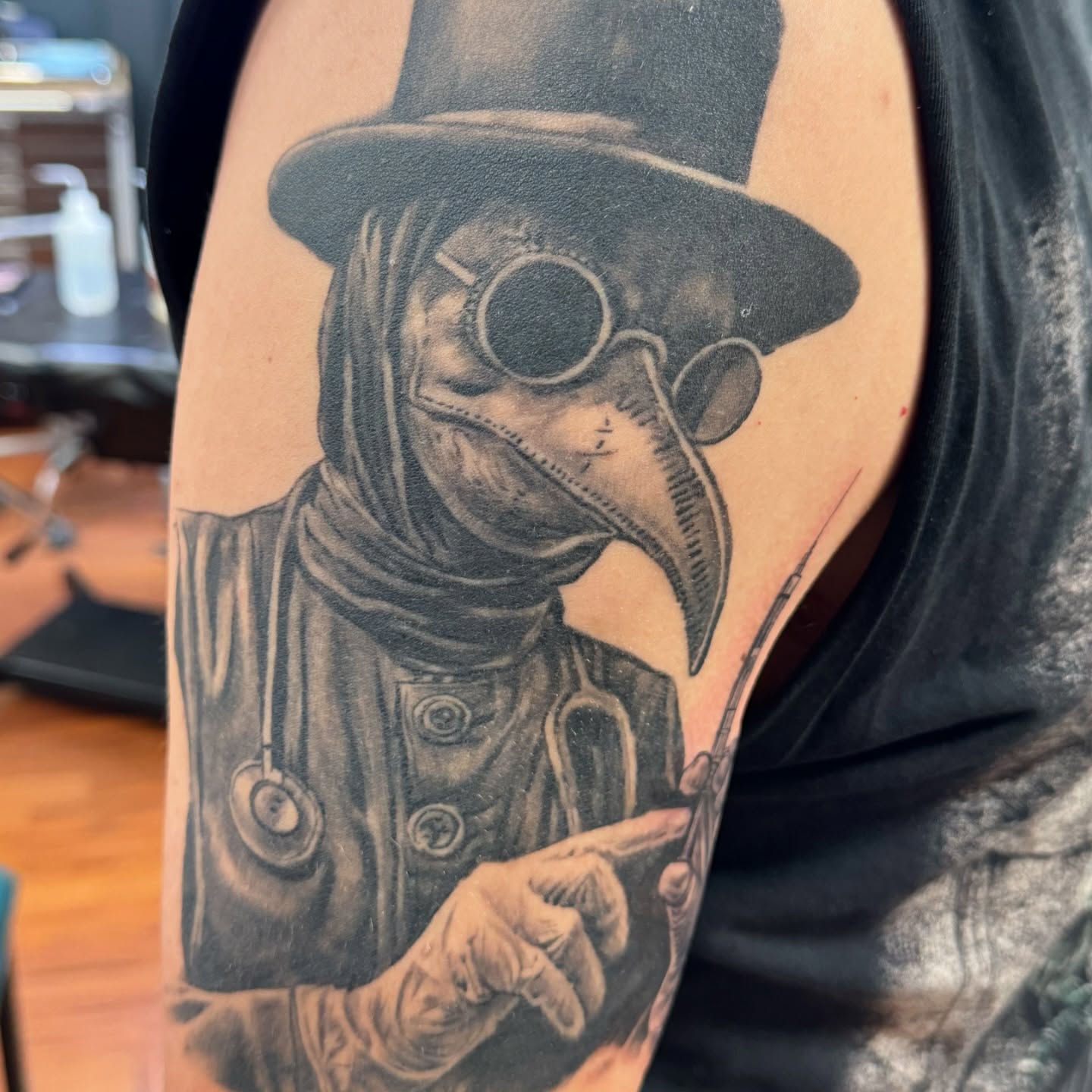 Plague doctor realism tattoo on the forearm by Hori Shit