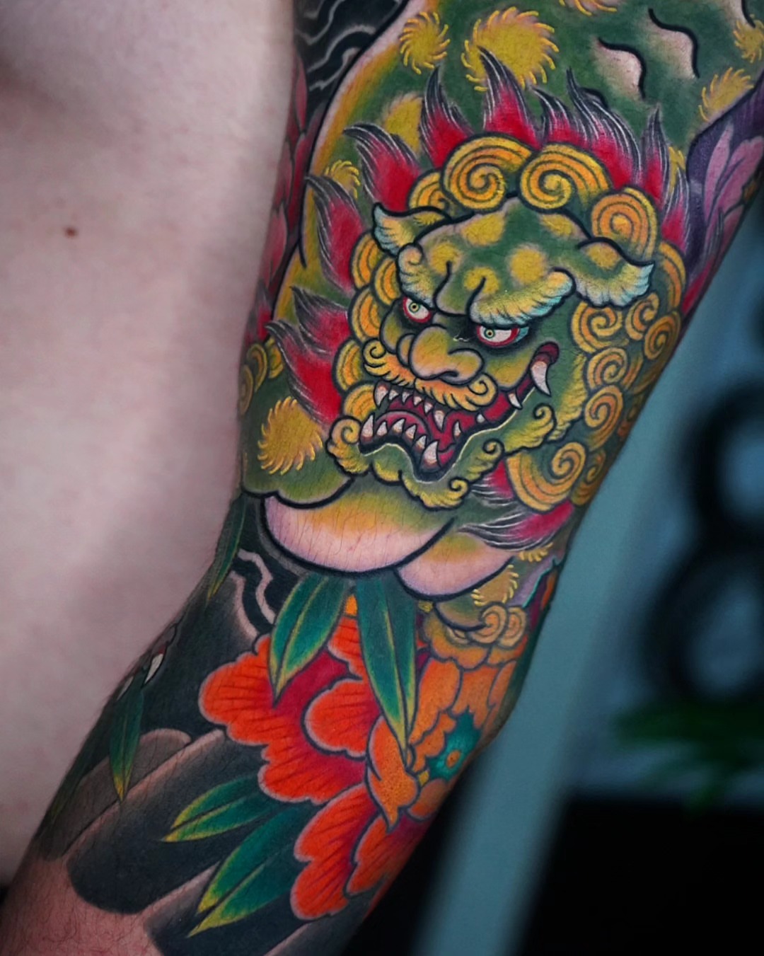 Lion mask japanese irezumi tattoo on the forearm by 彫かか