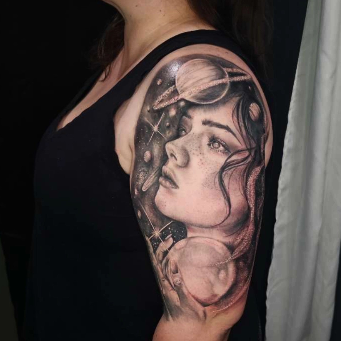 Space woman realism tattoo on the shoulder by Madelynne