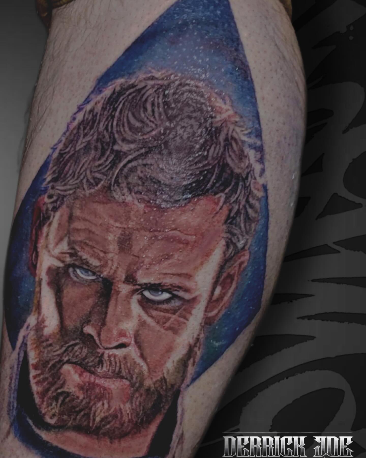Man's face realism tattoo on the forearm by Derrick Joe tattoos