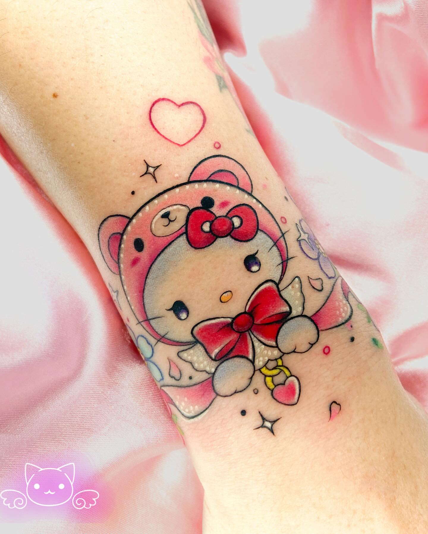 Hello Kitty dotwork tattoo on the forearm by Maria Camila yepes, Bogotá, Bogotá, Distrito Capital