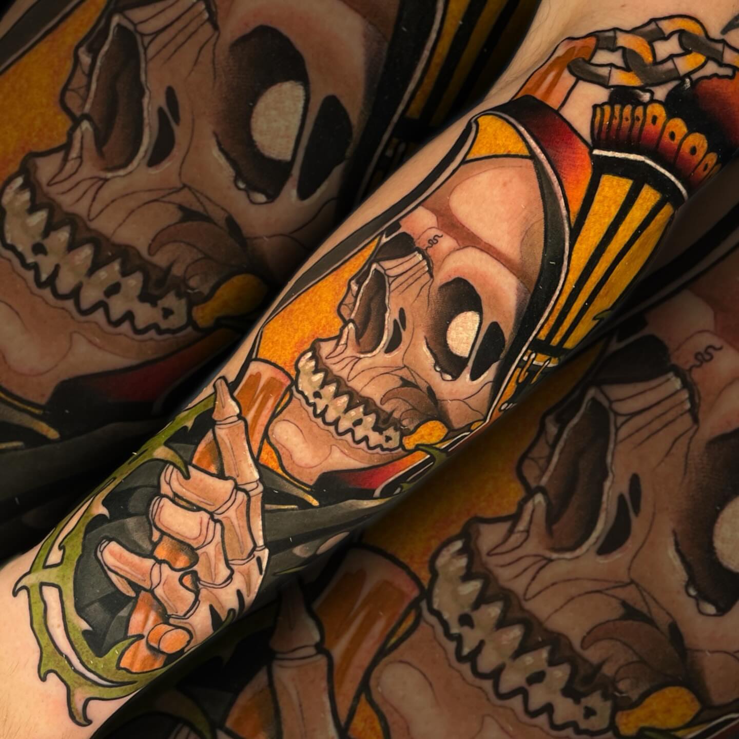 Skull and chain American traditional tattoo on the forearm by Nathan Mickle