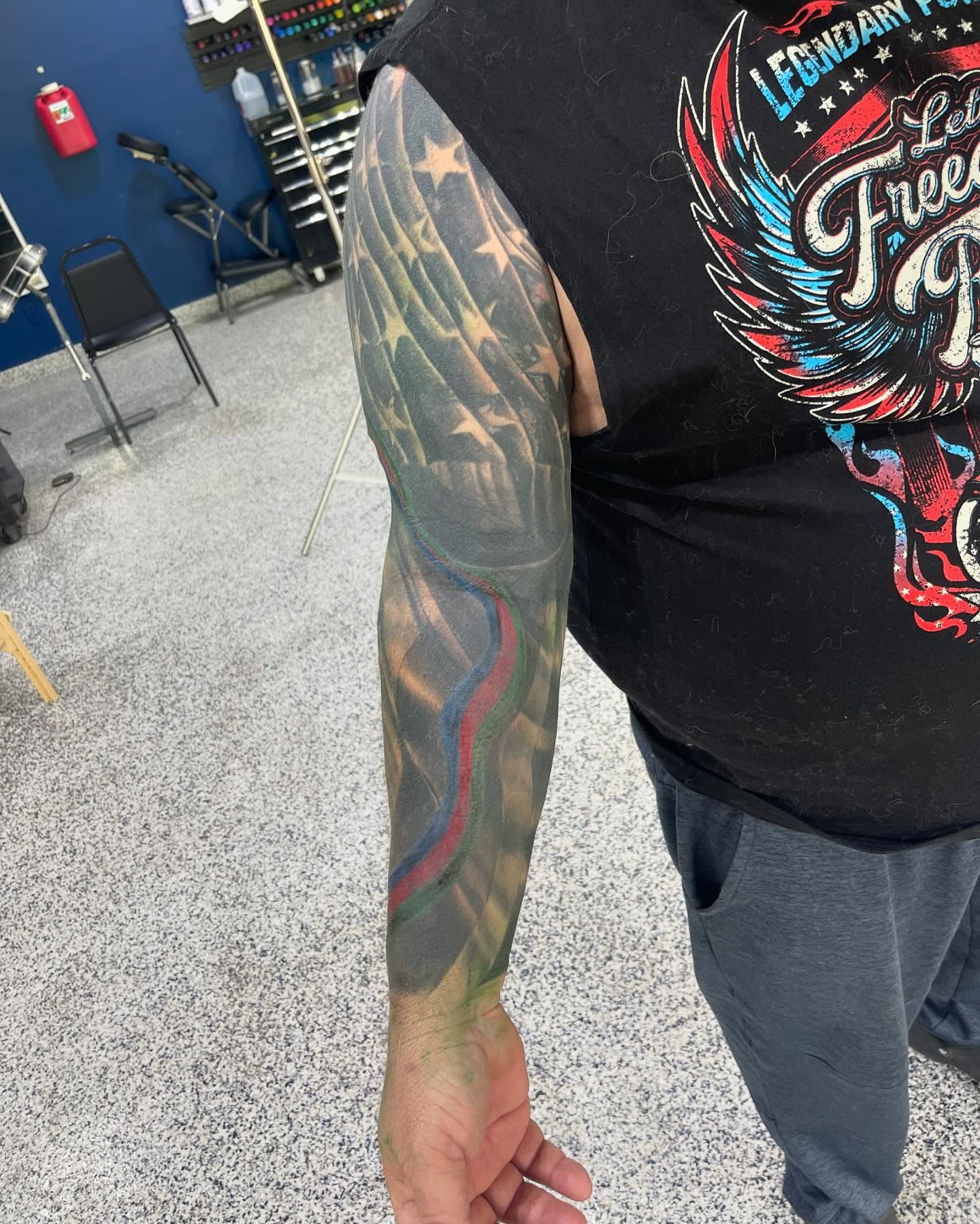 American flag American traditional tattoo on the forearm by Troy Butner