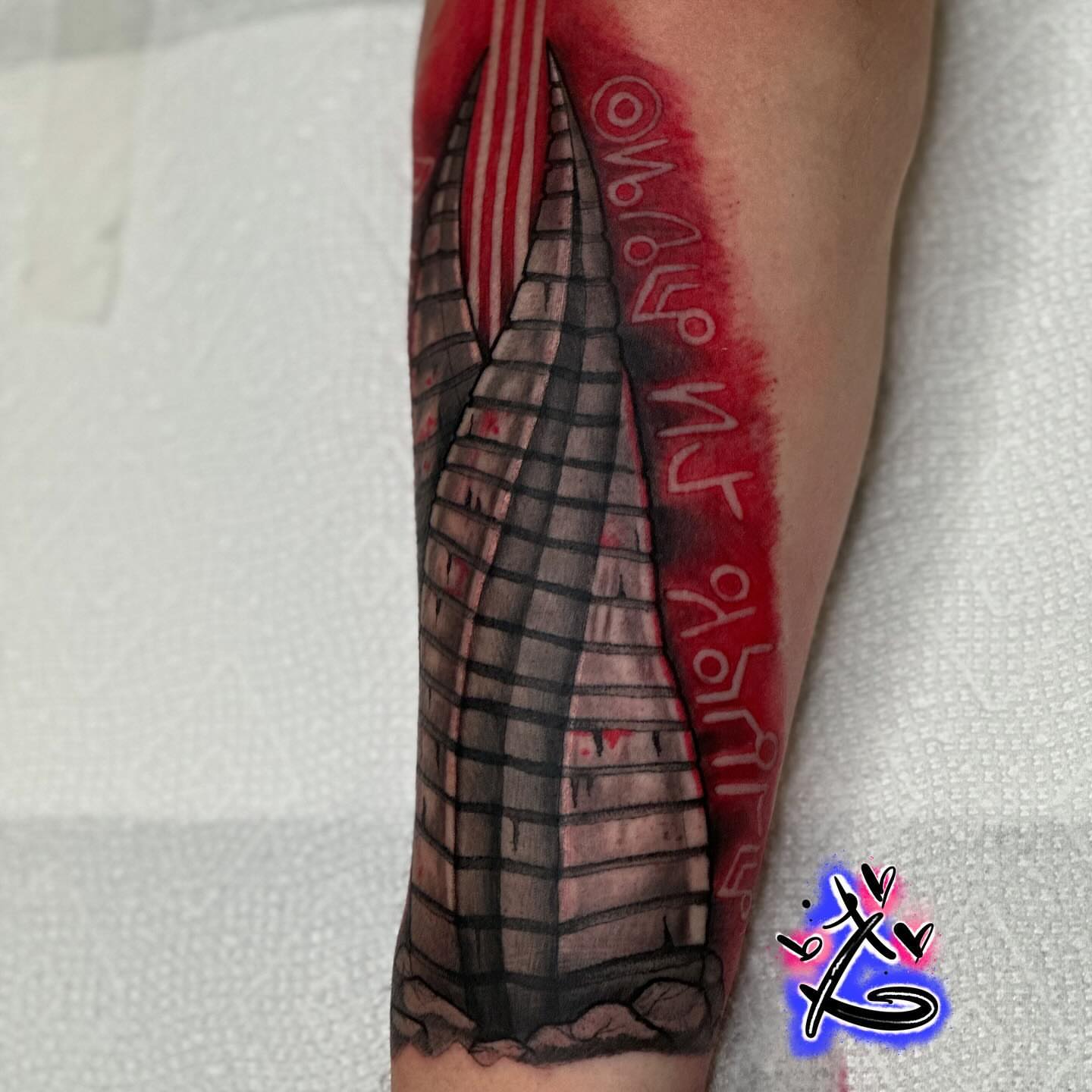 Pyramid geometric tattoo on the forearm by Keyon J