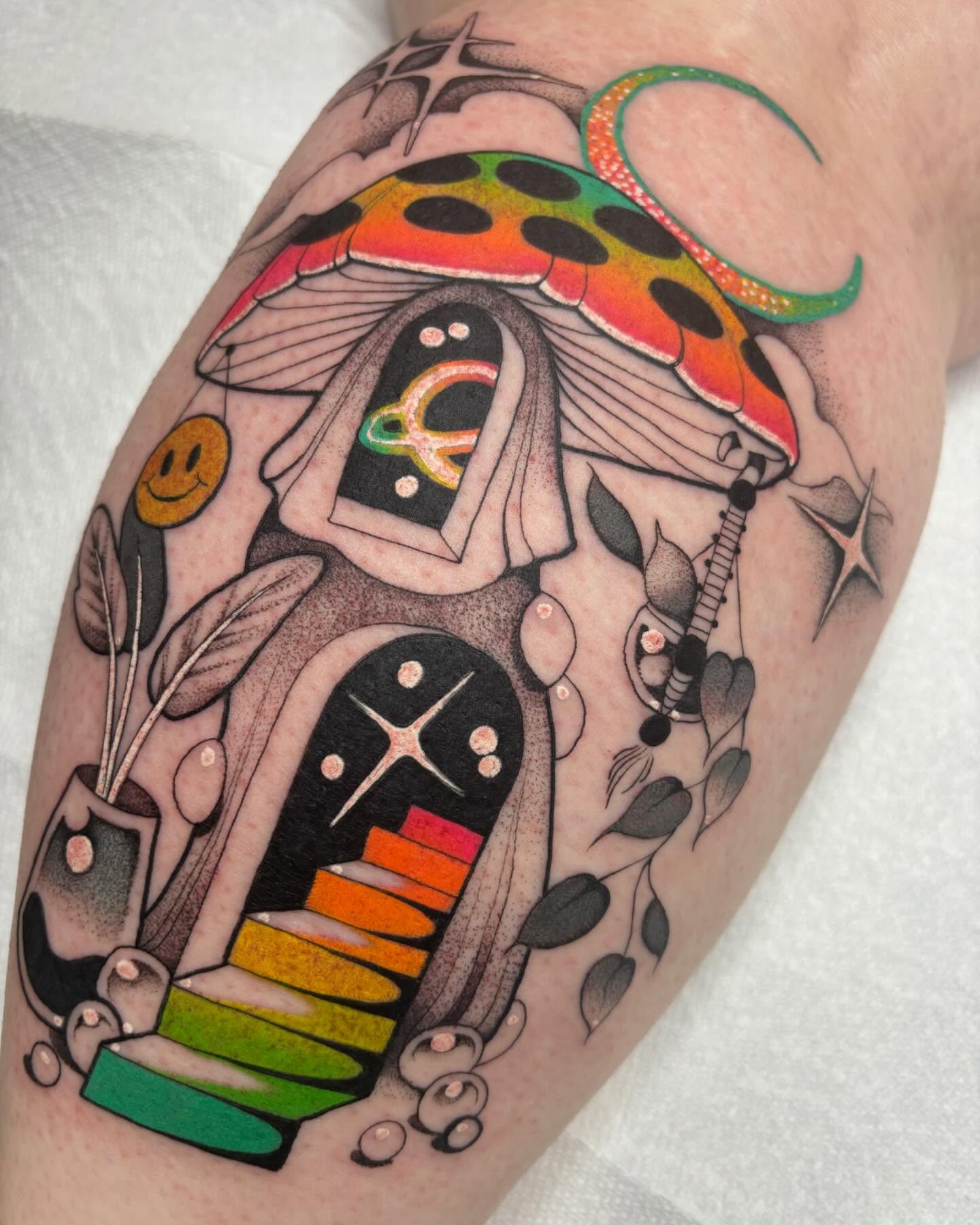 Mushroom house new school tattoo on the forearm by Carly Zehring